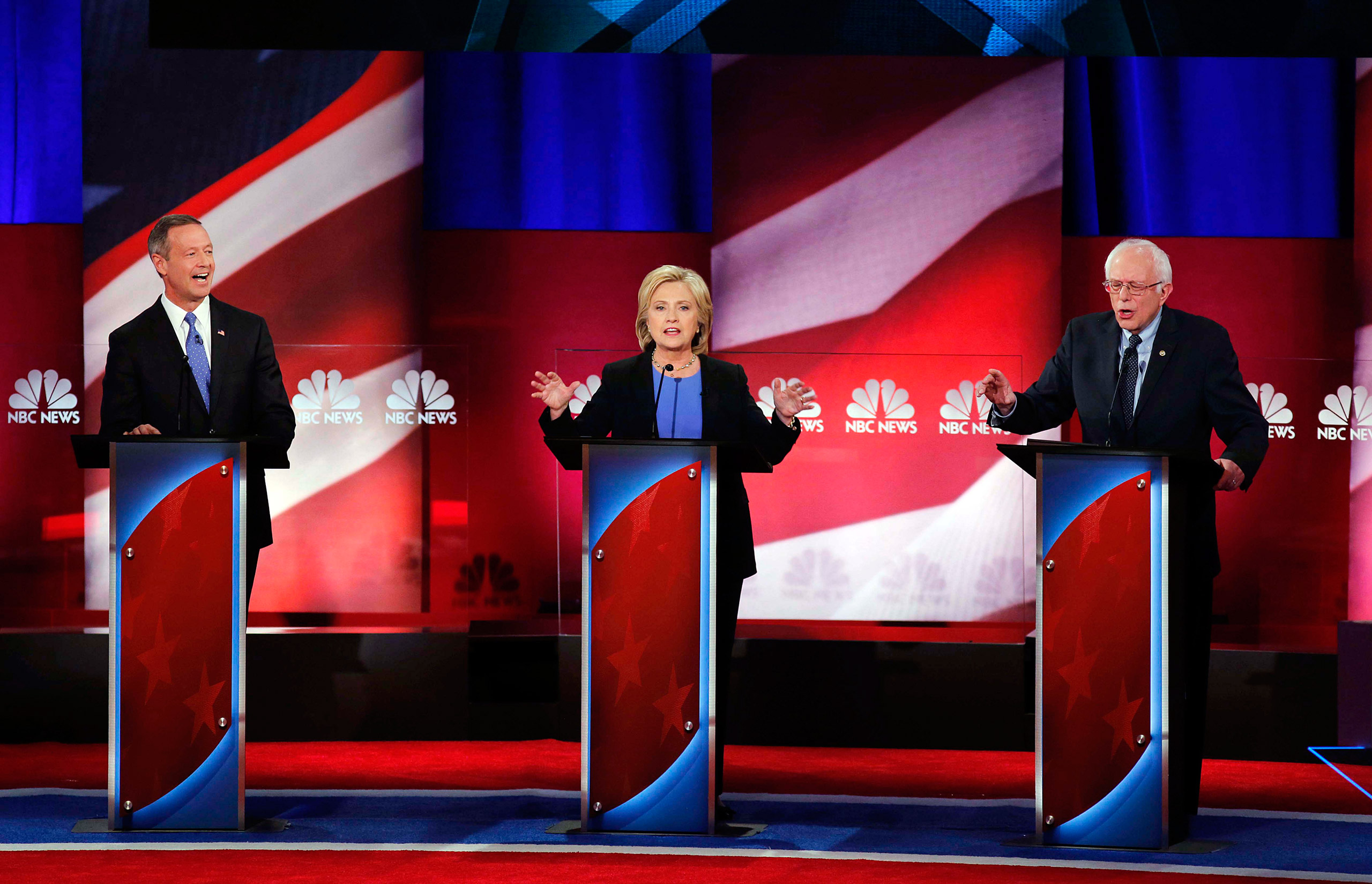 Democratic presidential candidate, Hillary Clinton, center, Democratic presidential candidate, Sen. Bernie Sanders, I-Vt. left, and Democratic presidential candidate, former Maryland Gov. Martin O'Malley, right, seems to speaks at the same time, during t