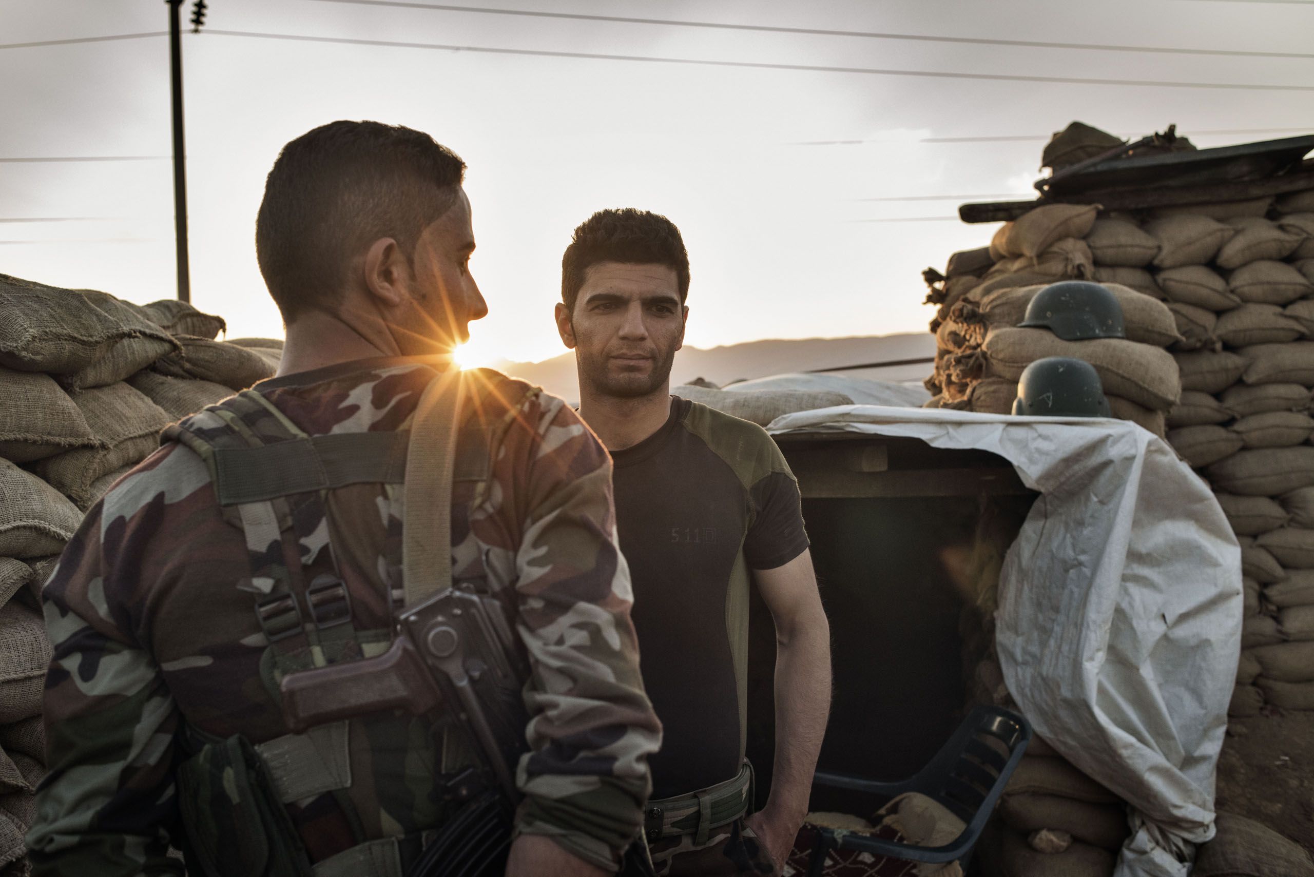 Kurdish fighters hold the front line against Islamic State militants outside the town of Sinjar, northern Iraq, May 12, 2016. Backed by airstrikes from a U.S.-led military coalition, Kurdish forces retook the town from ISIS in November 2015.