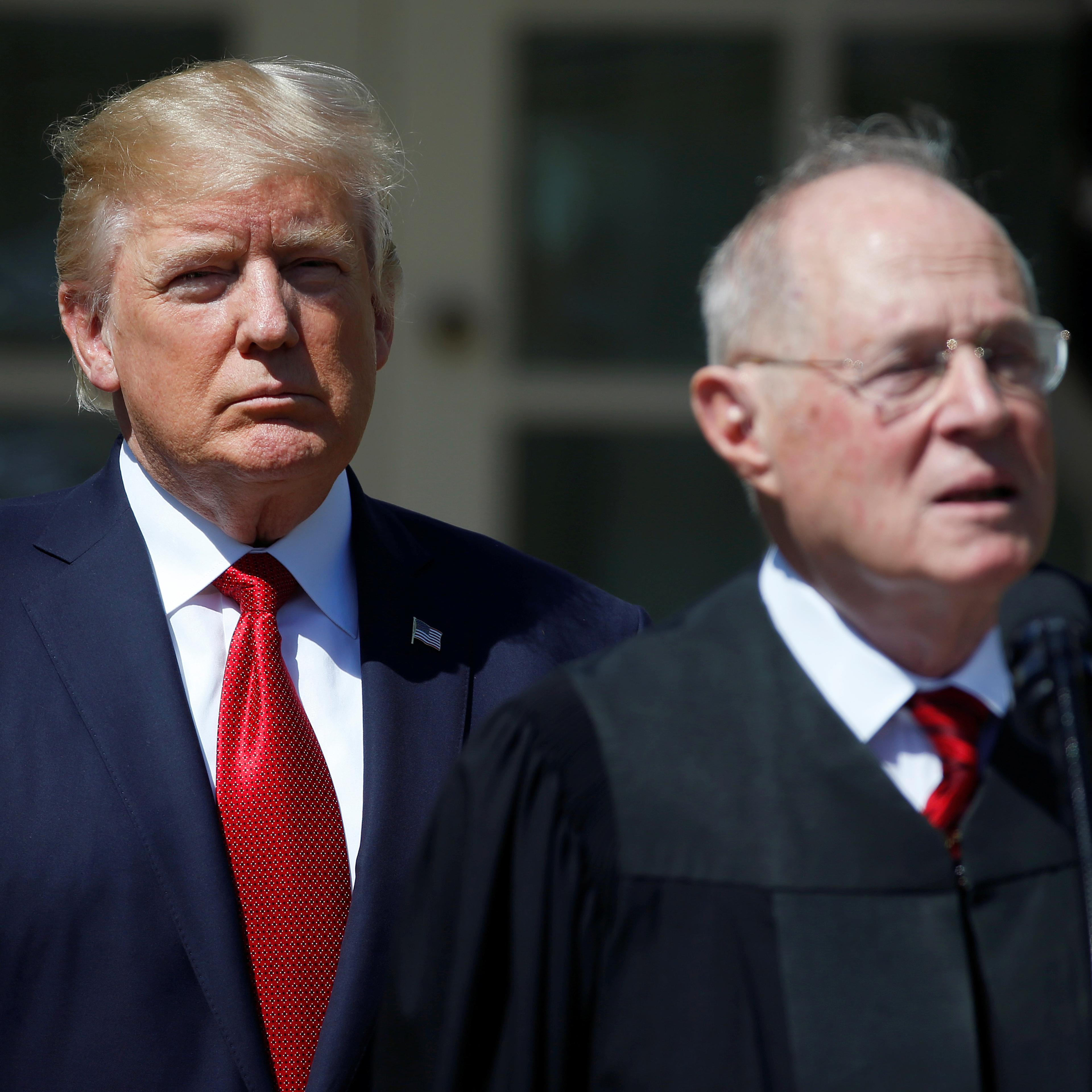 U.S. President Donald Trump listens as Justice Anthony Kennedy speaks before swearing in Judge Neil Gorsuch as an Associate Supreme Court Justice in the Rose Garden of the White House in Washington