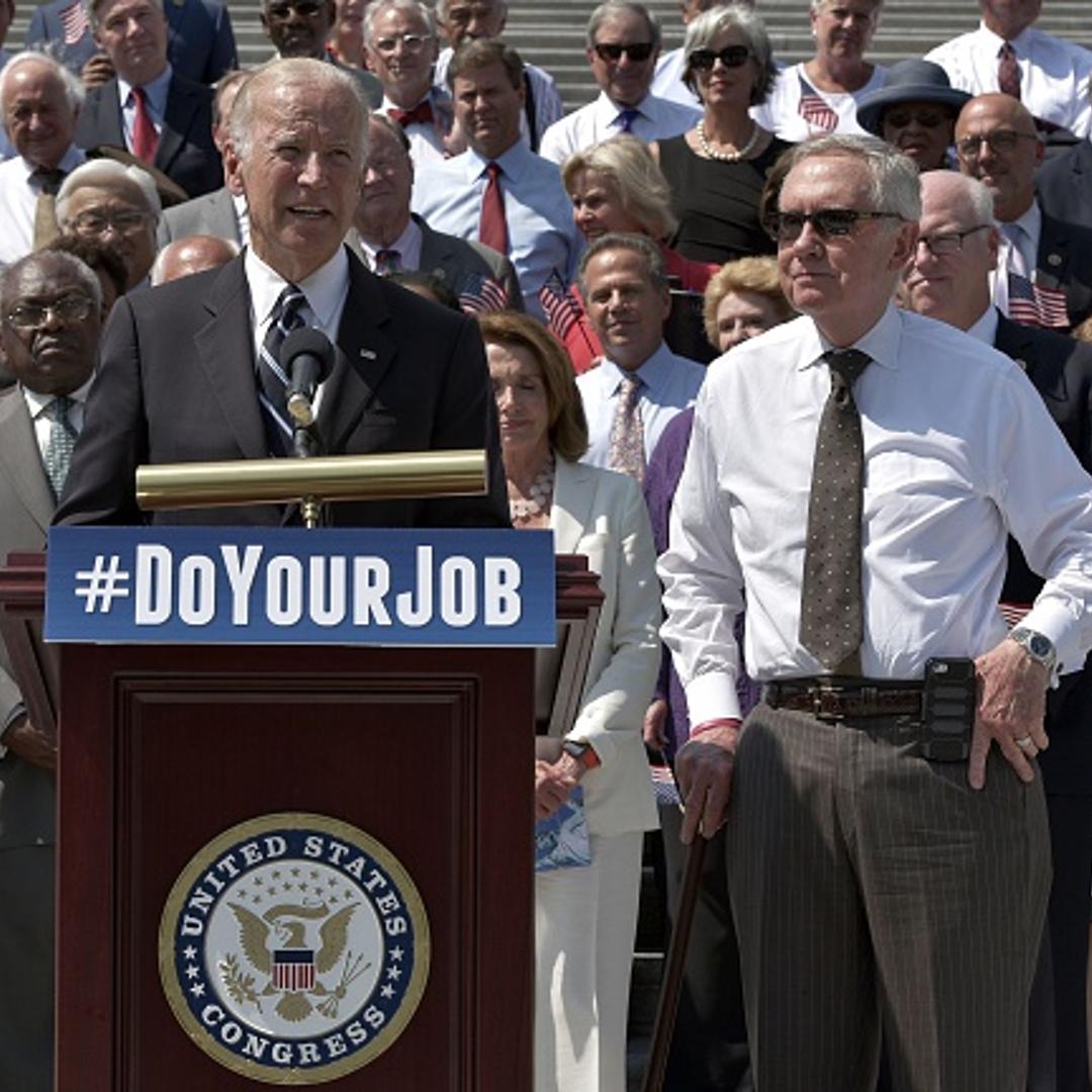 US Vice President Joe Biden speaks during an event with House and Senate Democrats to urge Republican lawmakers to take action on unfinished issues, as Senate Minority Leader Harry Reid (R), D-NV, watches on September 8, 2016 at the East Front steps of t