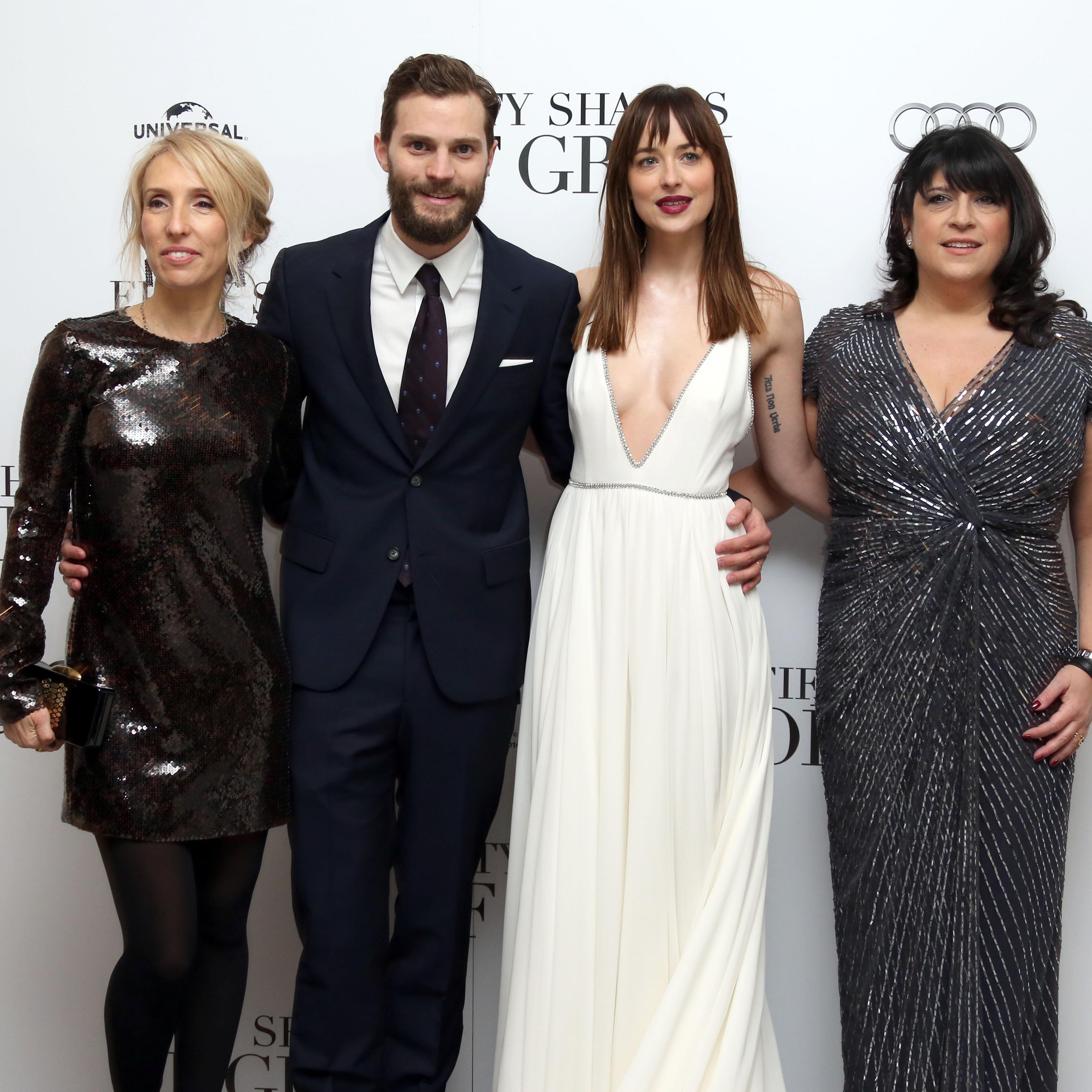 Sam Taylor-Johnson, Jamie Dornan, Dakota Johnson and E.L. James pose for photographers upon arrival at the UK premiere of the film Fifty Shades of Grey in London, Feb. 12, 2015