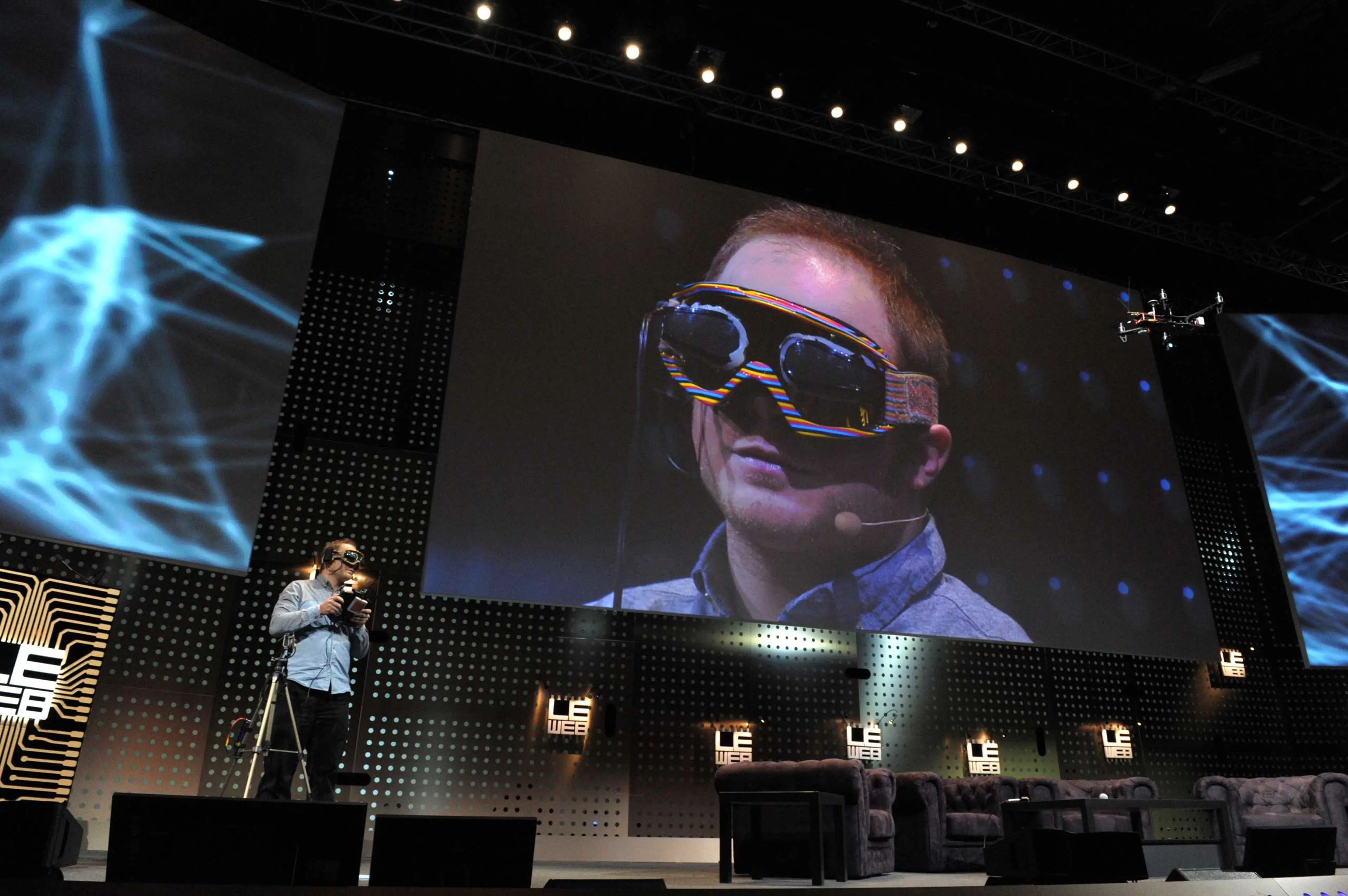 Raphael Pirker from Switzerland, founder of Team BlackSheep used virtual reality goggles to simulate the sensation of flight in the real world during a demonstration, flying from the perspective of a model aircraft, during a session of LeWeb'12 in Saint-