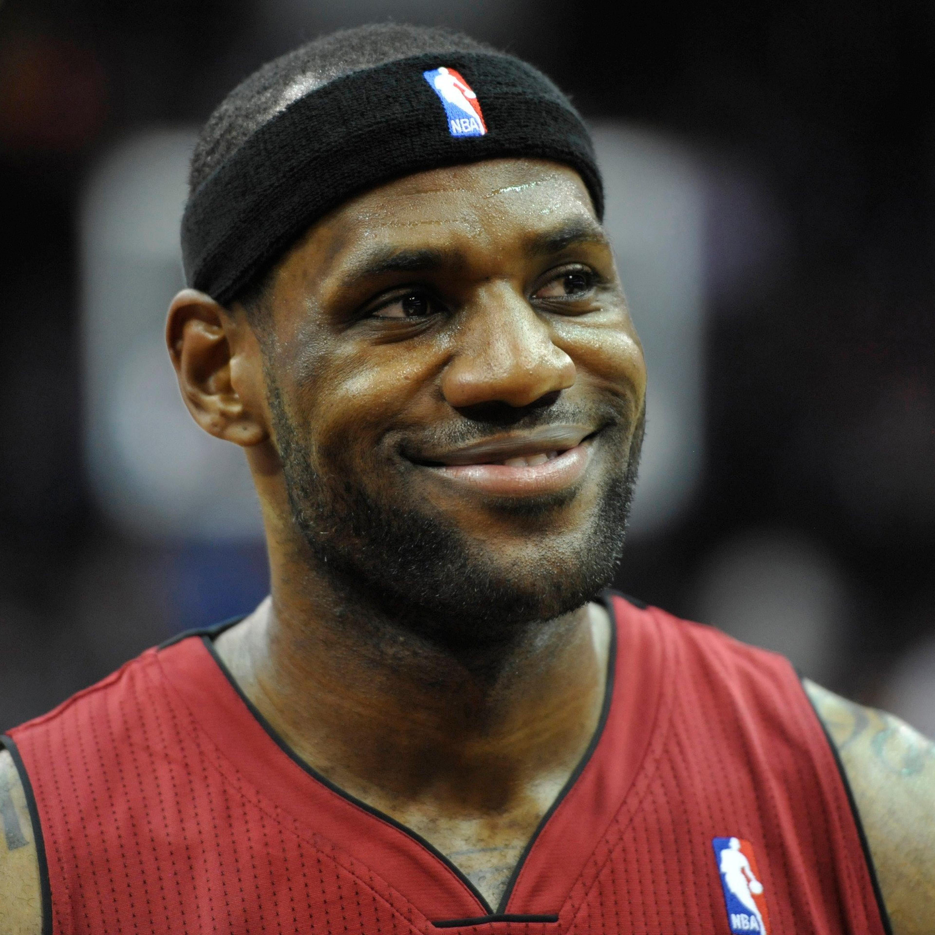 Miami Heat forward LeBron James smiles after a 100-96 win over the Cleveland Cavaliers at Quicken Loans Arena