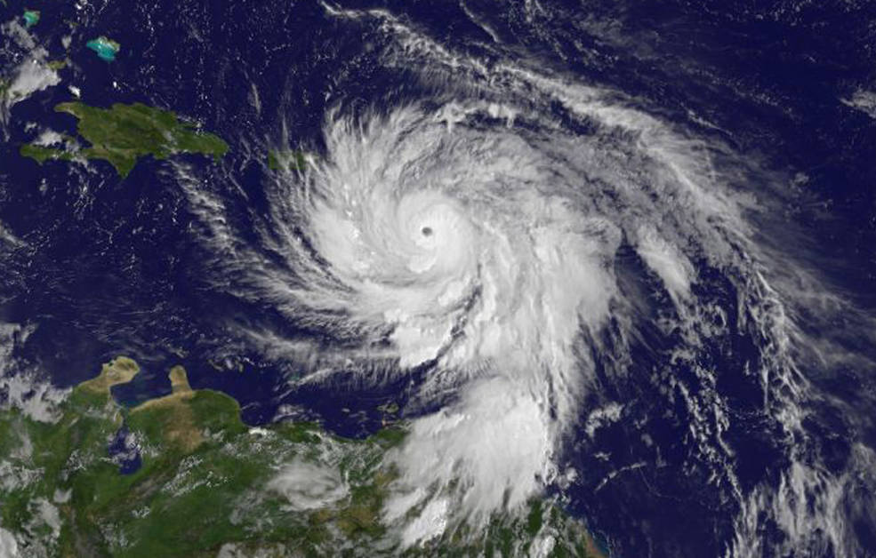 A satellite image shows Hurricane Maria approaching Puerto Rico