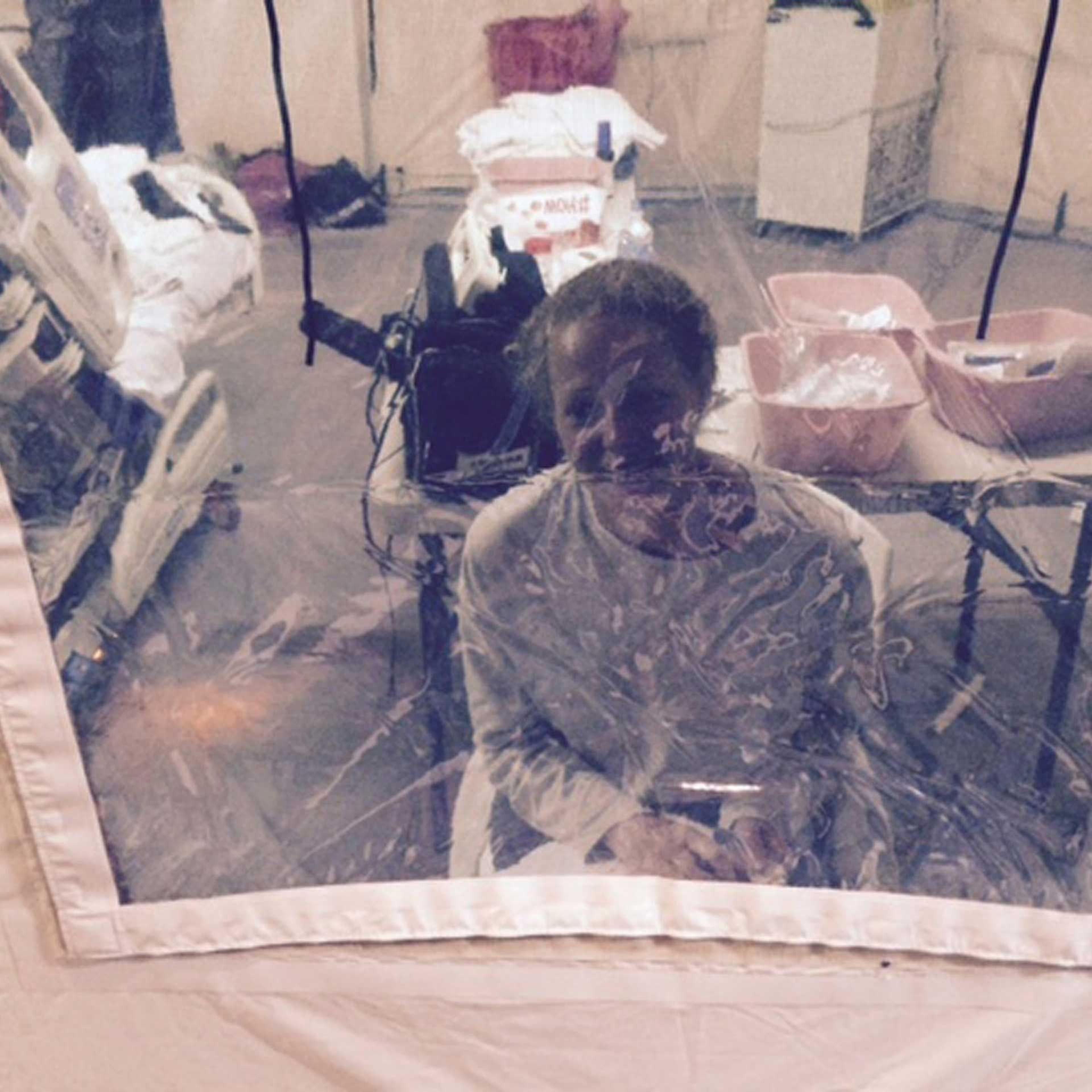 Kaci Hickox, a nurse who arrived in New Jersey on October 24 after treating Ebola patients in West Africa, seen in a hospital quarantine tent in Newark, New Jersey, Oct. 26, 2014.