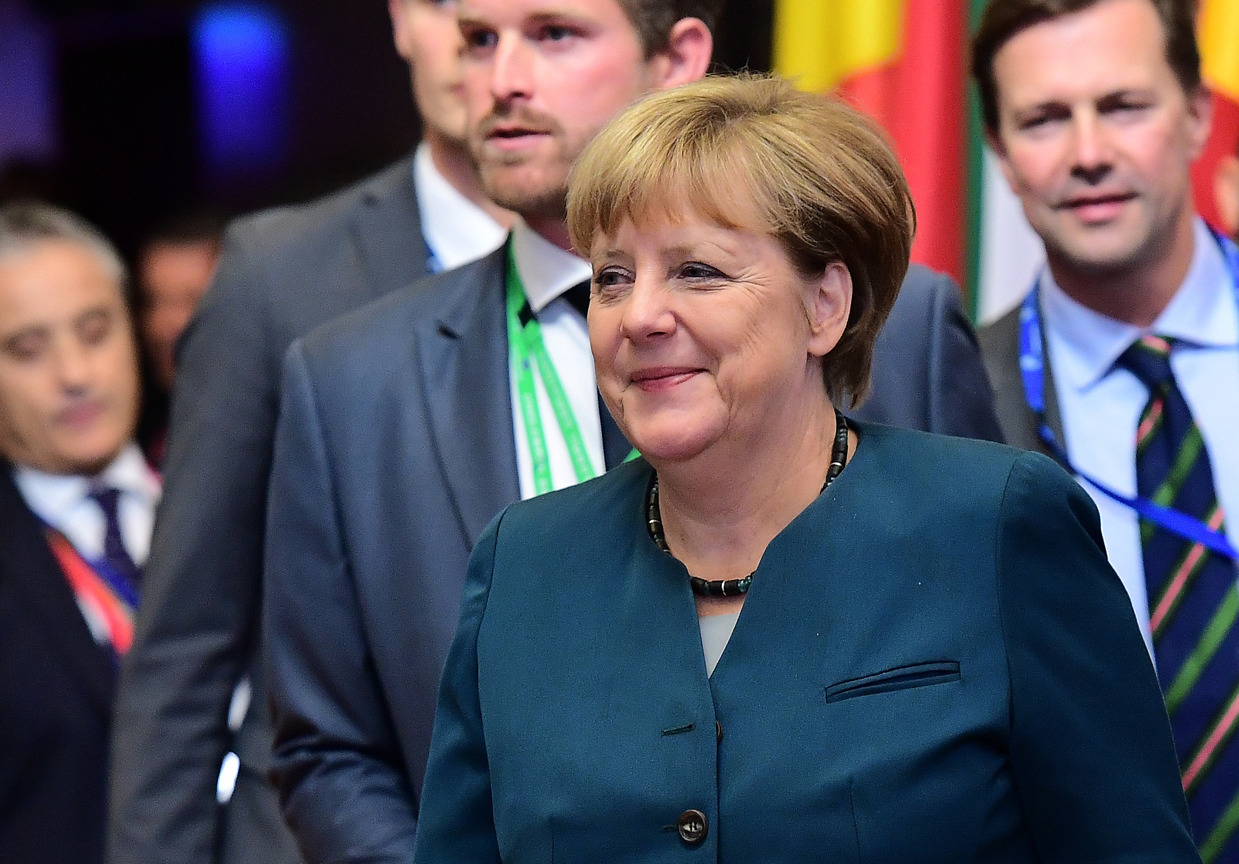 German Chancellor Angela Merkel looks on as she leaves the European Union leaders summit on October 21, 2016 at the European Council, in Brussels.