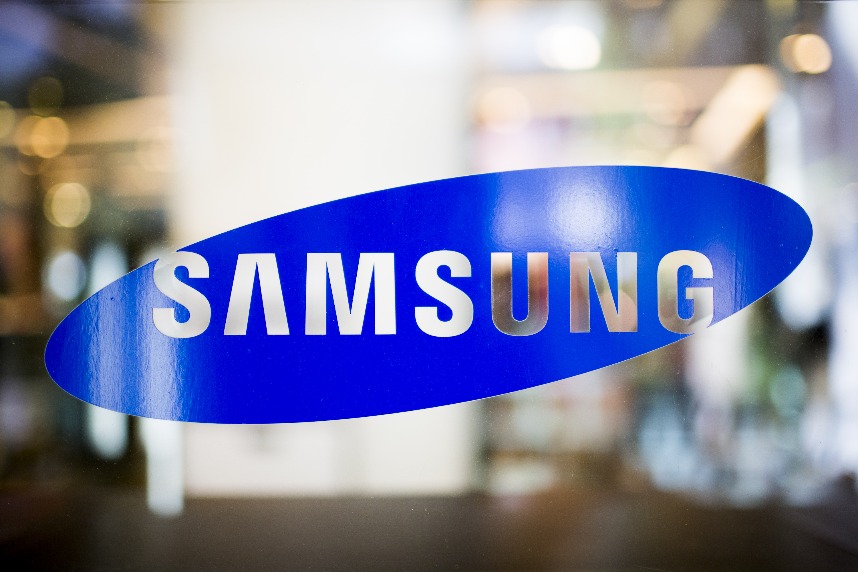 The Samsung Electronics Co. logo is displayed at a store in Bangkok, Thailand, on Thursday, Oct. 4, 2012.
