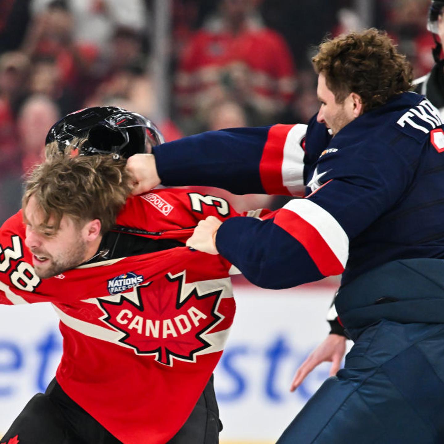 Matthew Tkachuk #19 of Team U.S.A and Brandon Hagel #38 of Team Canada fight in the first period during the 2025 NHL 4 Nations Face-Off at the Bell Centre in Montreal, Canada, on Feb. 15, 2025.