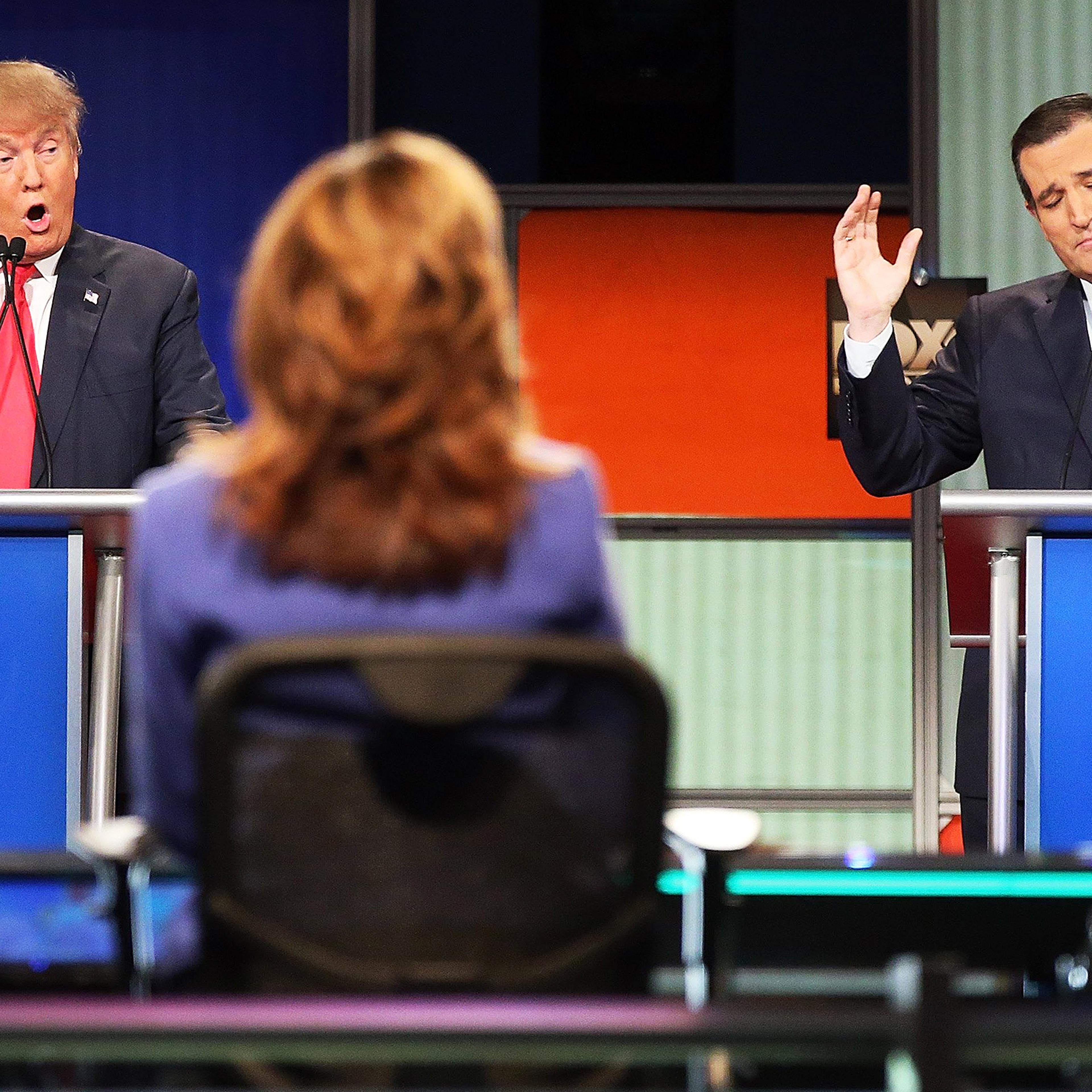 Republican presidential candidates Donald Trump, left, and Sen. Ted Cruz (R-TX) participate in the Republican presidential debate at the North Charleston Coliseum and Performing Arts Center on Jan. 14, 2016 in North Charleston, S.C.