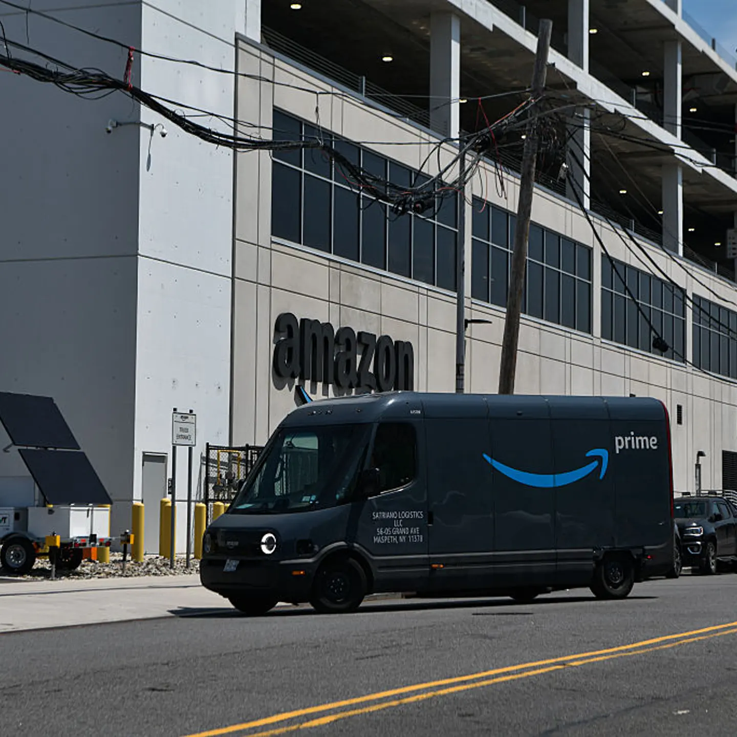 A delivery van outside an Amazon facility on Amazon Prime Day in the Queens borough of New York, on July 8, 2025.