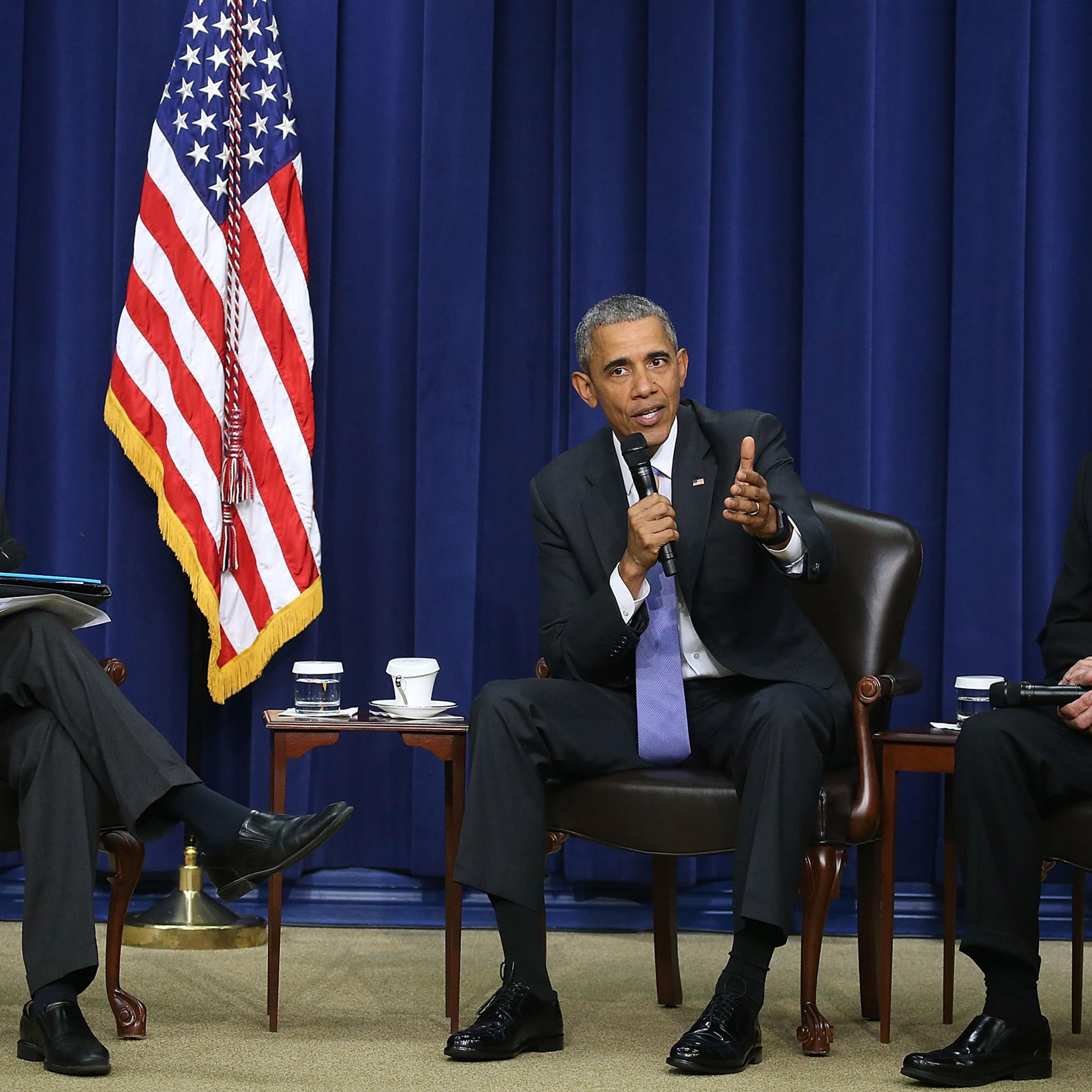 WASHINGTON, DC - OCTOBER 22: U.S. President Barack Obama participates in a conversation on criminal justice reform while flanked by Bill Keller (L) of The Marshall Project, and Charlie Beck (R) of the Los Angleles Police, at the White House October 22, 2