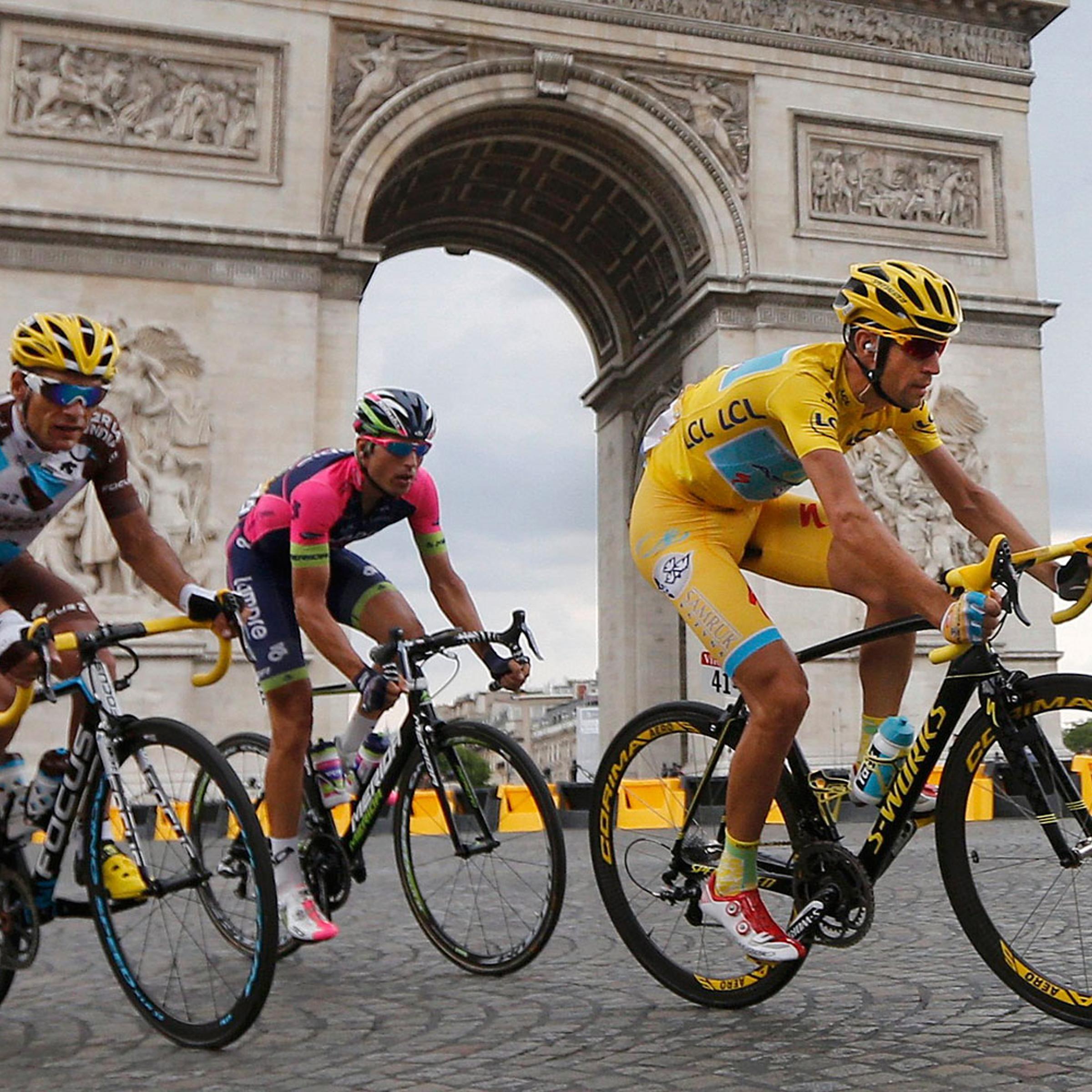 Race leader Astana team rider Nibali of Italy rides near the Arc de Triomphe at the end of the final 21st stage of the Tour de France in Paris