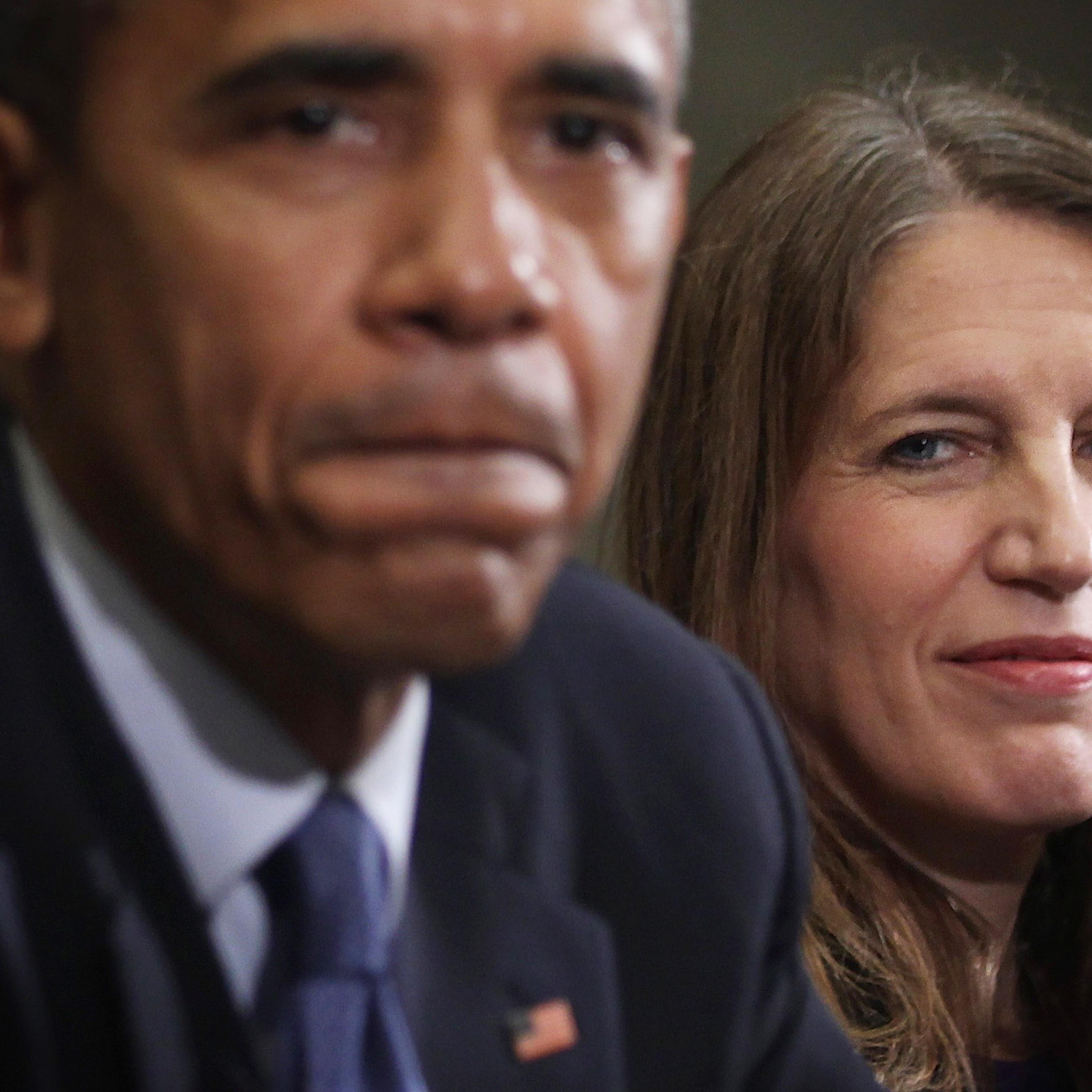 Barack Obama pauses as Secretary of Health and Human Services Sylvia Burwell looks on during a meeting with citizens who wrote letters to him about Affordable Care Act at the White House in Washington, D.C. on Feb. 3, 2015.