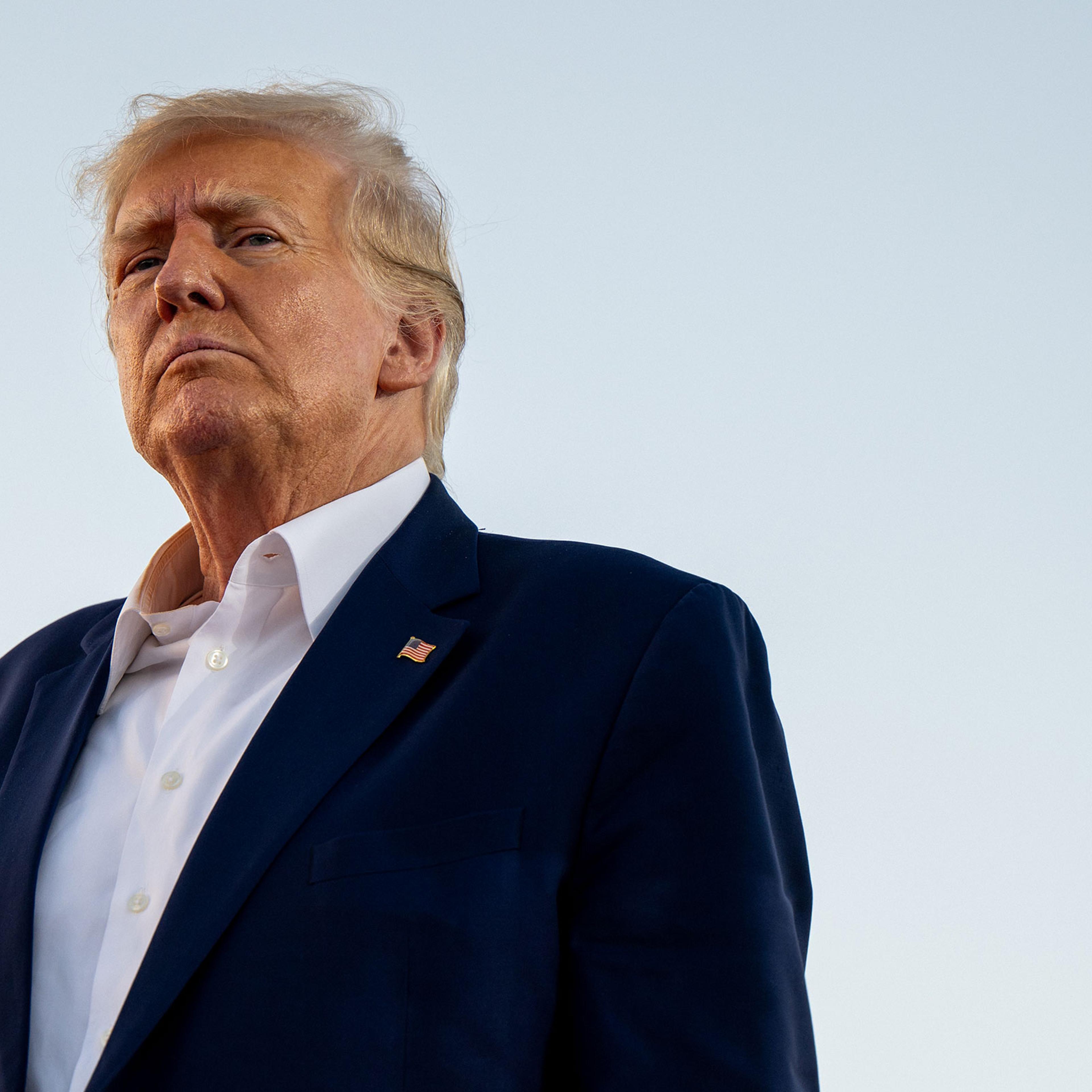Former President Donald Trump looks on during a rally at the Waco Regional Airport in Waco, Texas, on March 25, 2023.