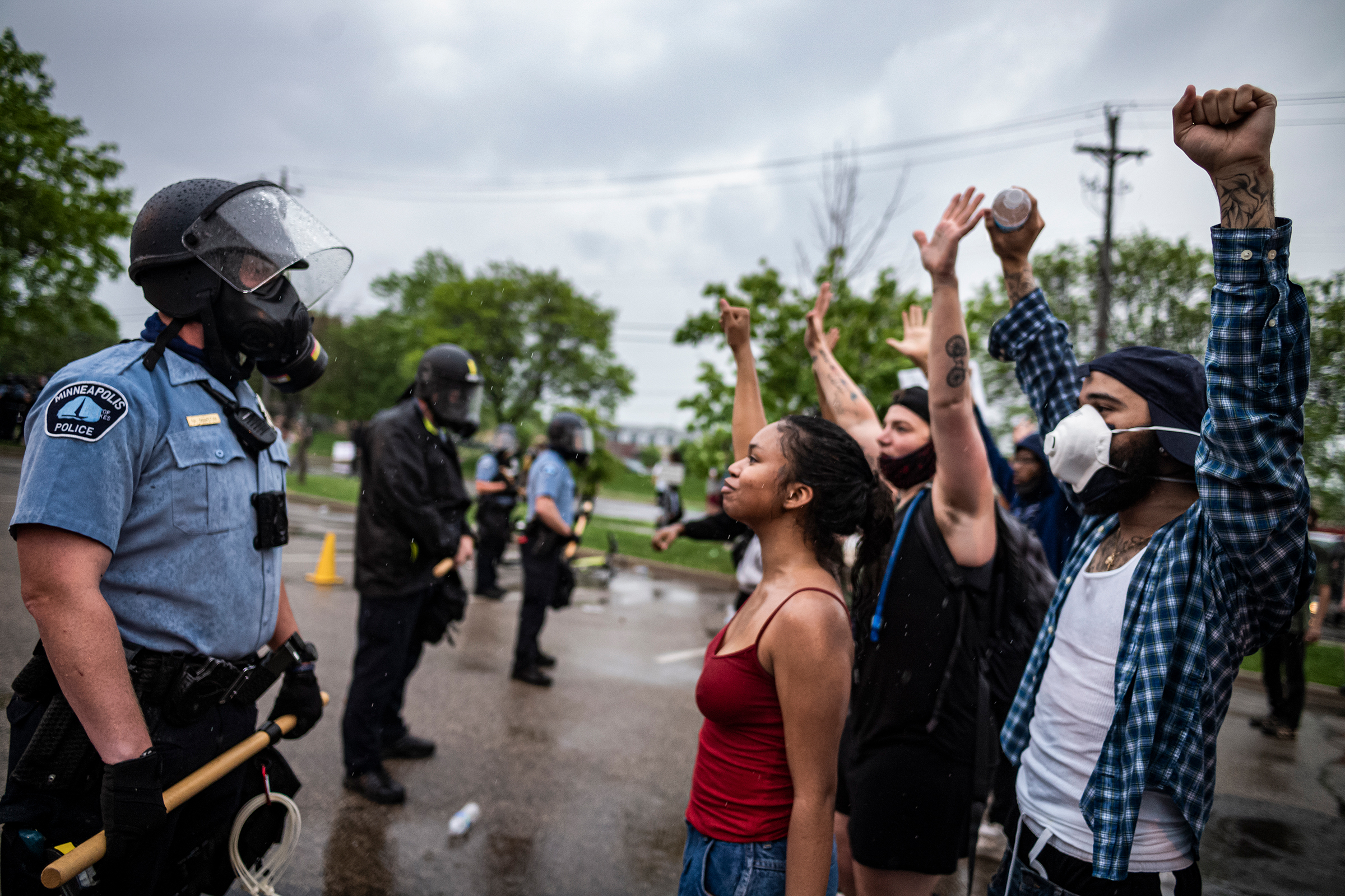 Protesters face off with police in Minneapolis on May 26 after video footage from a day earlier surfaced showing a white officer kneeling on the neck of a handcuffed black man—identified as George Floyd by an attorney for his family—despite saying he cou
