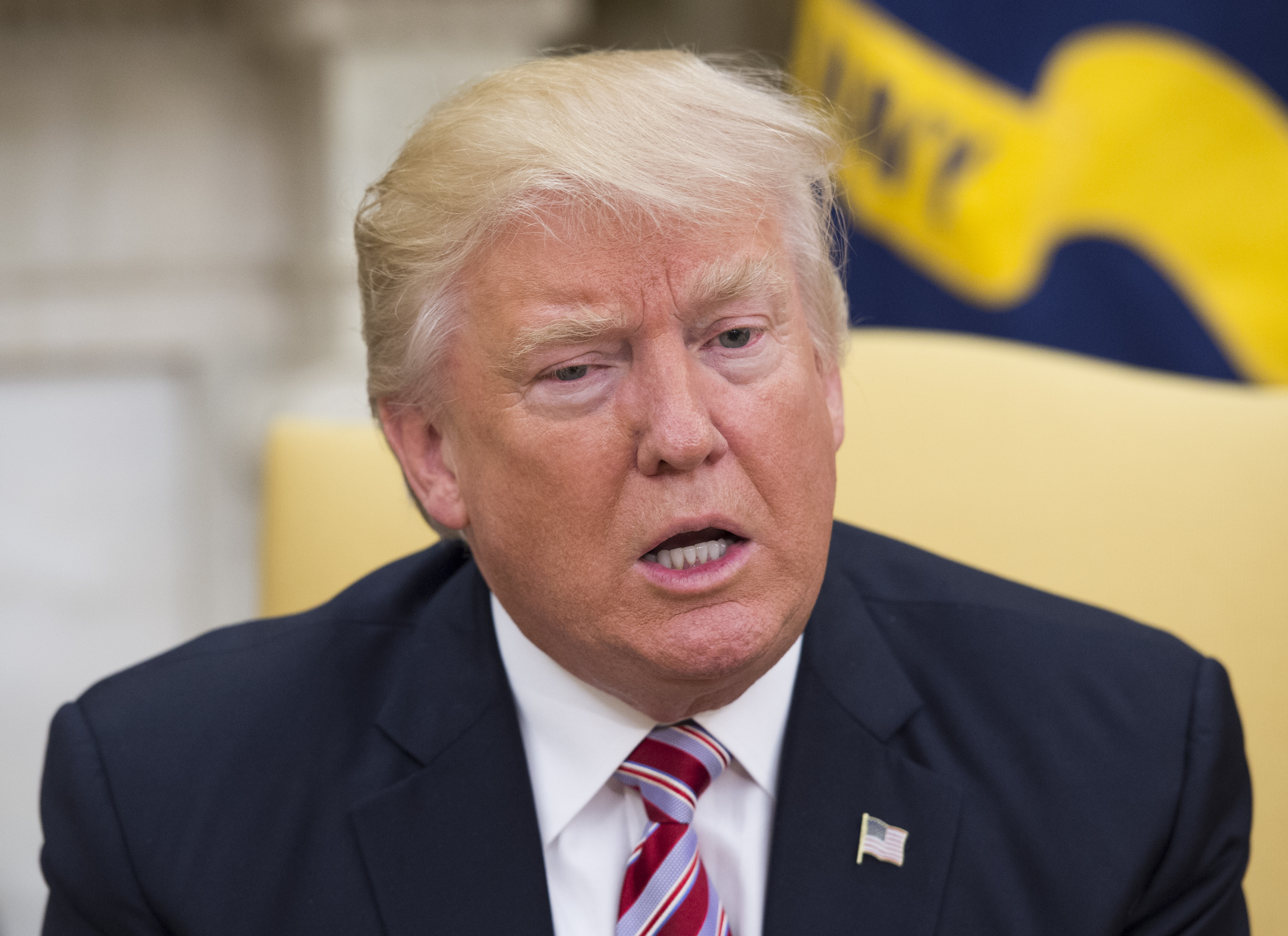 President Donald Trump meets with former Secretary of State Henry Kissinger in the Oval Office at the White House on May 10, 2017 in Washington, D.C.