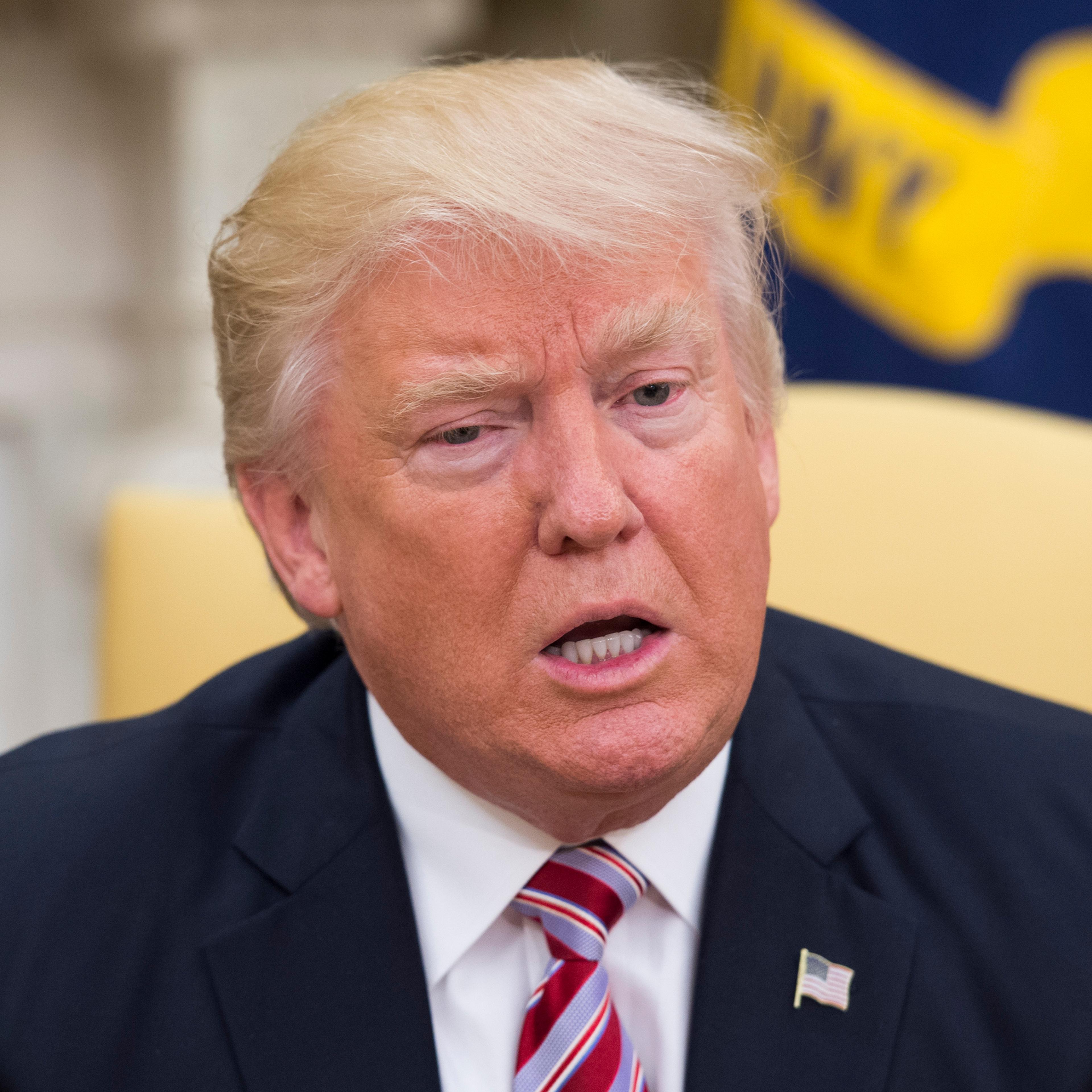 President Donald Trump meets with former Secretary of State Henry Kissinger in the Oval Office at the White House on May 10, 2017 in Washington, D.C.