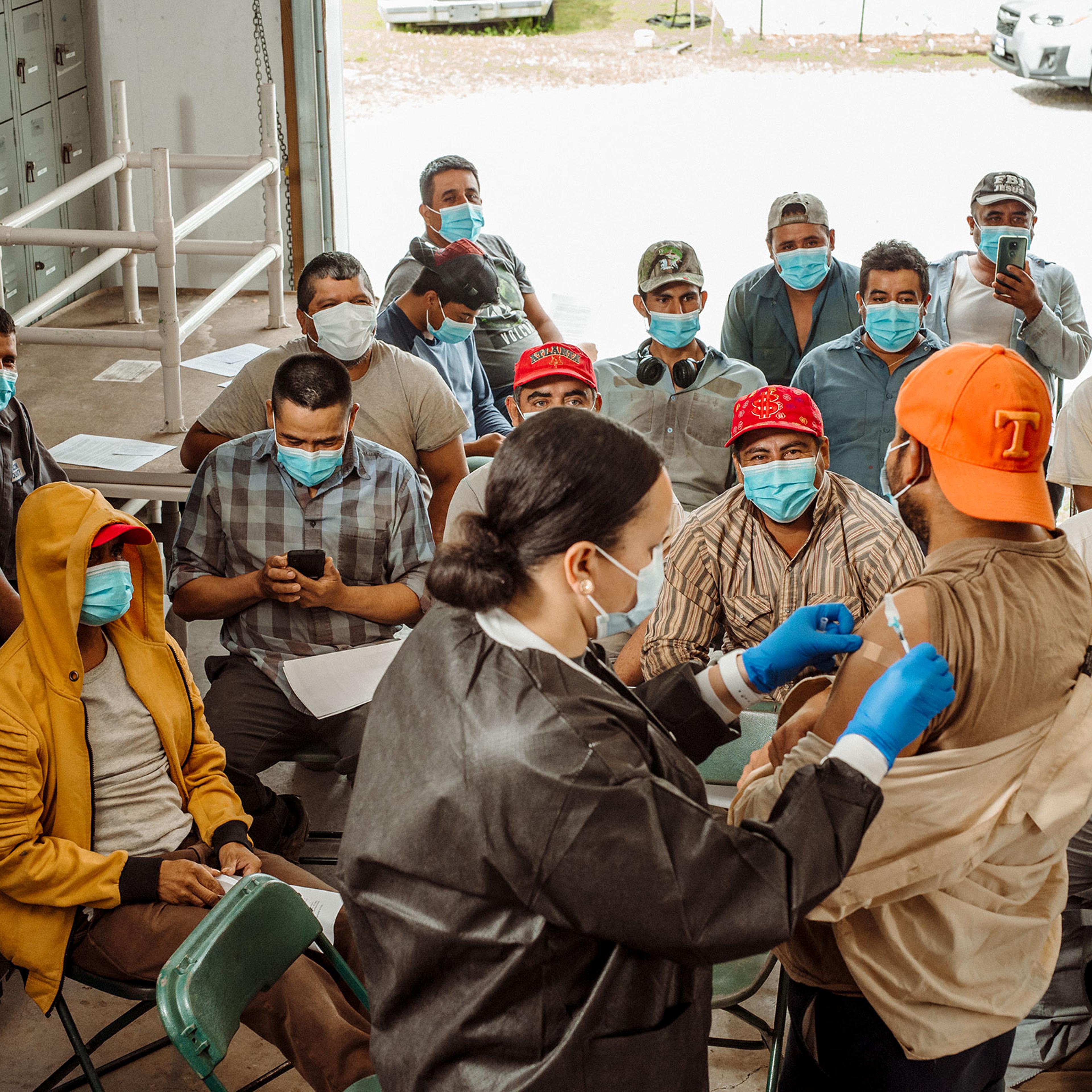 Tennessee health department staff vaccinate workers at Jones and Church Farms on June 1