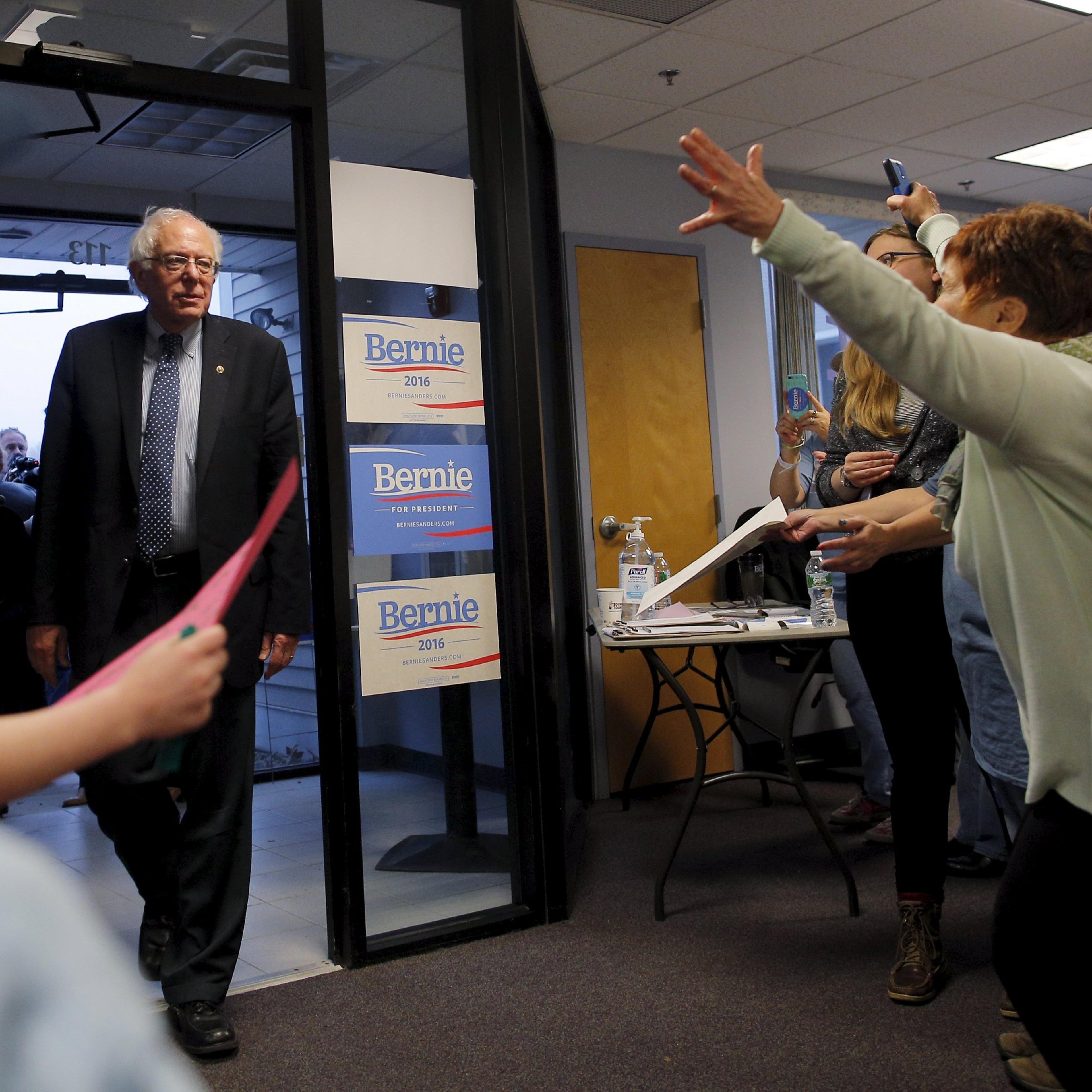 Supporters welcome U.S. Democratic presidential candidate and U.S. Senator Bernie Sanders as they open a new regional campaign field office in Salem