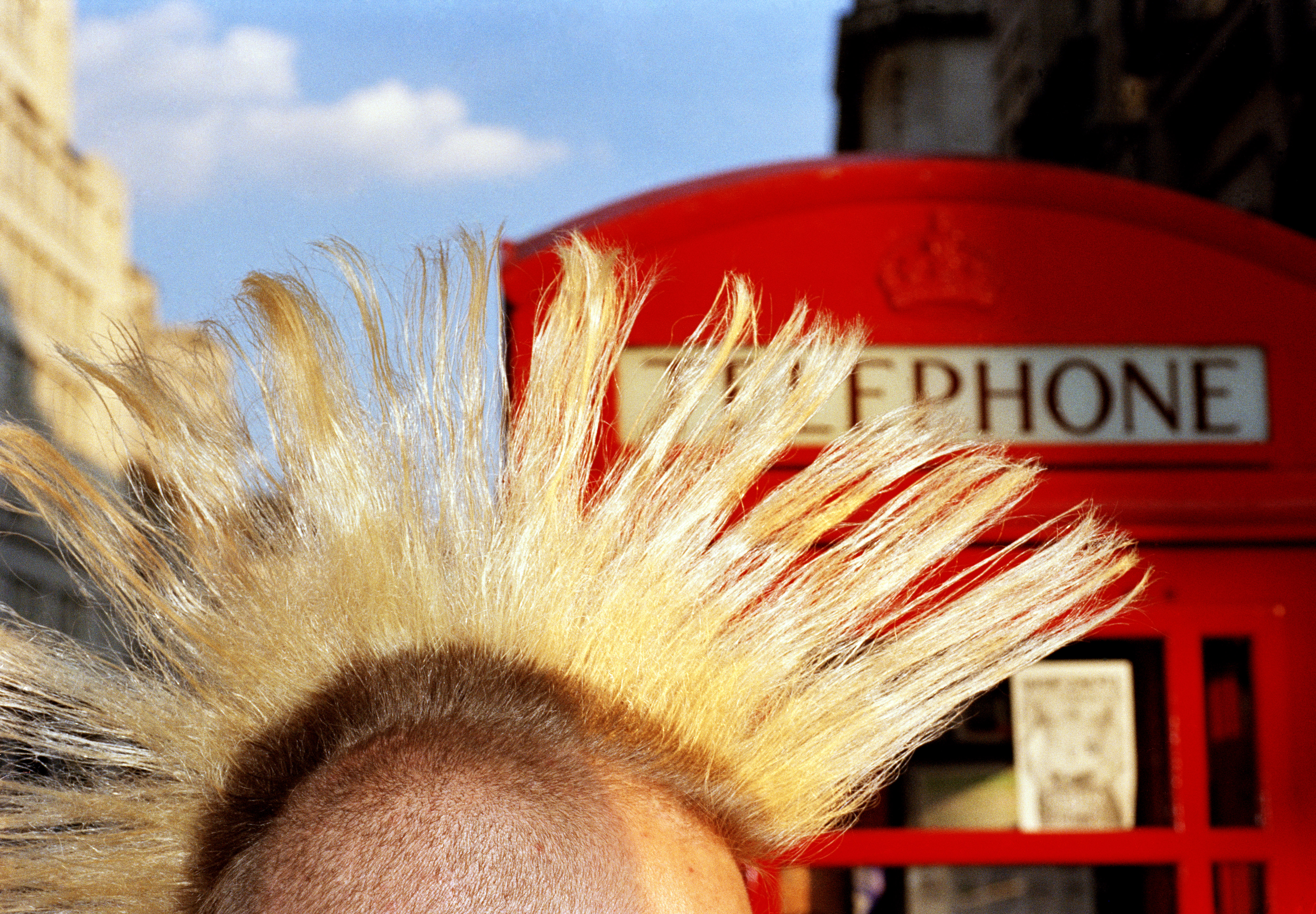 1997. Some punks kept their Mohican haircuts and lived by charging tourists money to photograph them (often by a red bus or telephone box).
