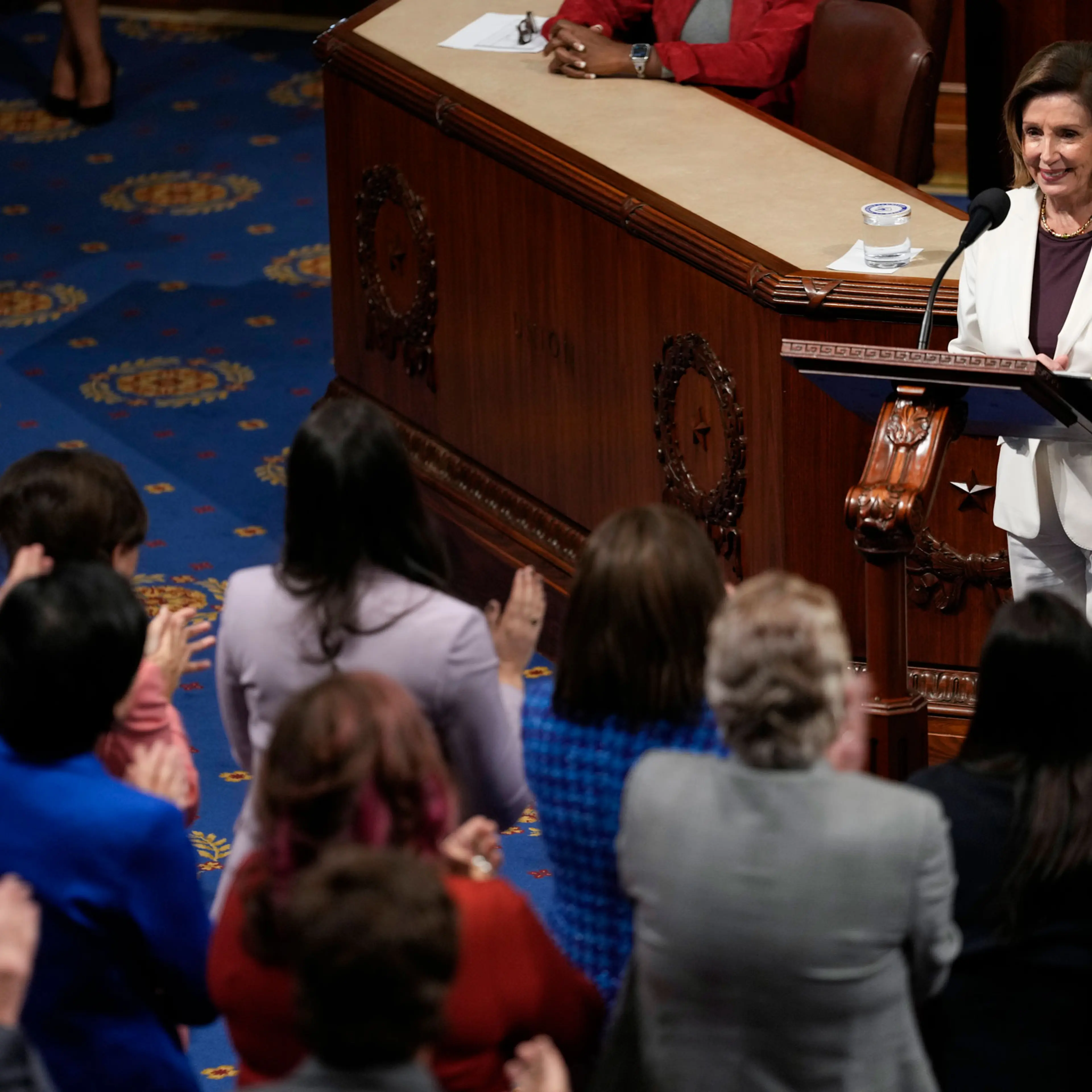 House Speaker Nancy Pelosi of Calif., pauses as lawmakers stand and applaud as she speaks on the House floor at the Capitol in Washington, on Nov. 17, 2022.
