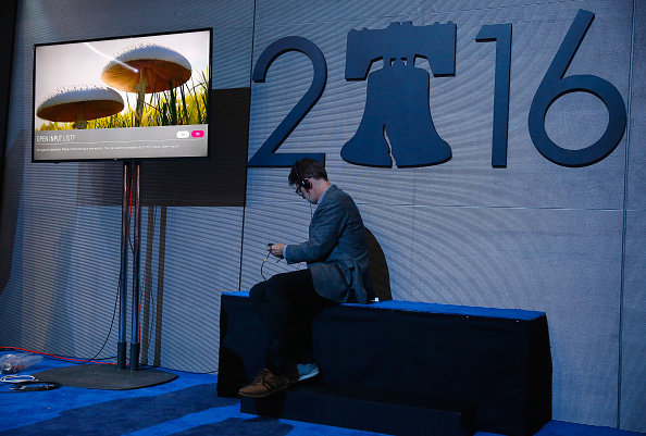 An attendee prepares for the start of the second day of the Democratic National Convention at the Wells Fargo Center, July 26, 2016 in Philadelphia, Pennsylvania.