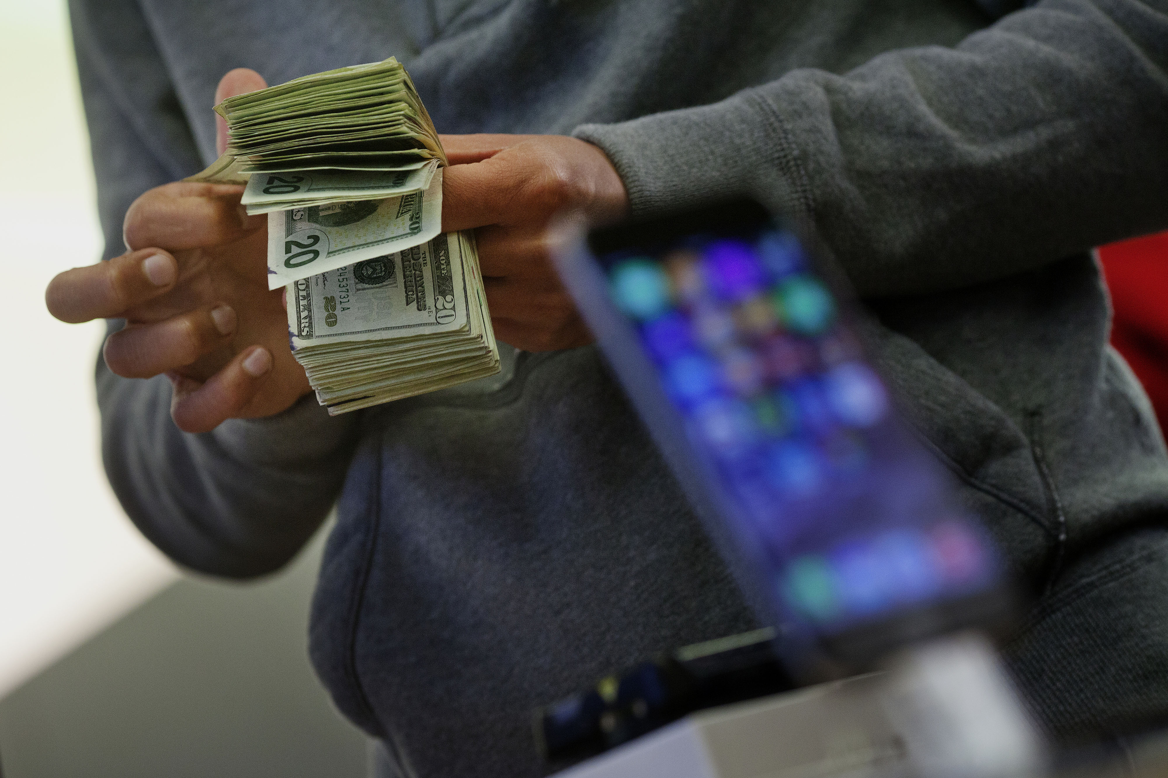 Apple's New Big-Screen iPhones Draw Long Lines As Sales Start