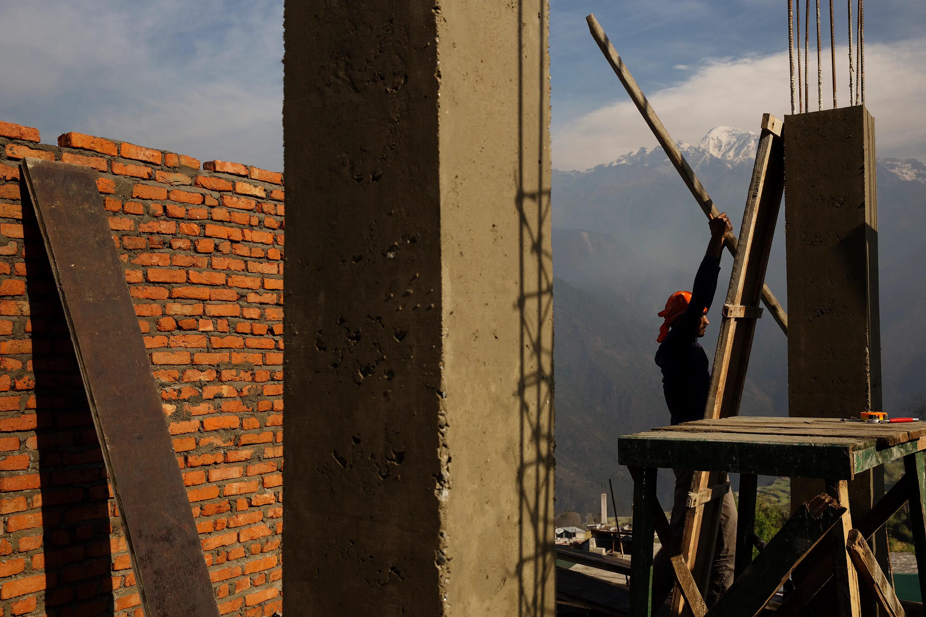 Villagers rebuild houses in Barpak, in Gorkha district, at the epicenter of the 2015 earthquakes. In the immediate aftermath of the disaster, landslides left Barpak and other remote villages cut-off from the rest of Nepal. Entire communities were rendere