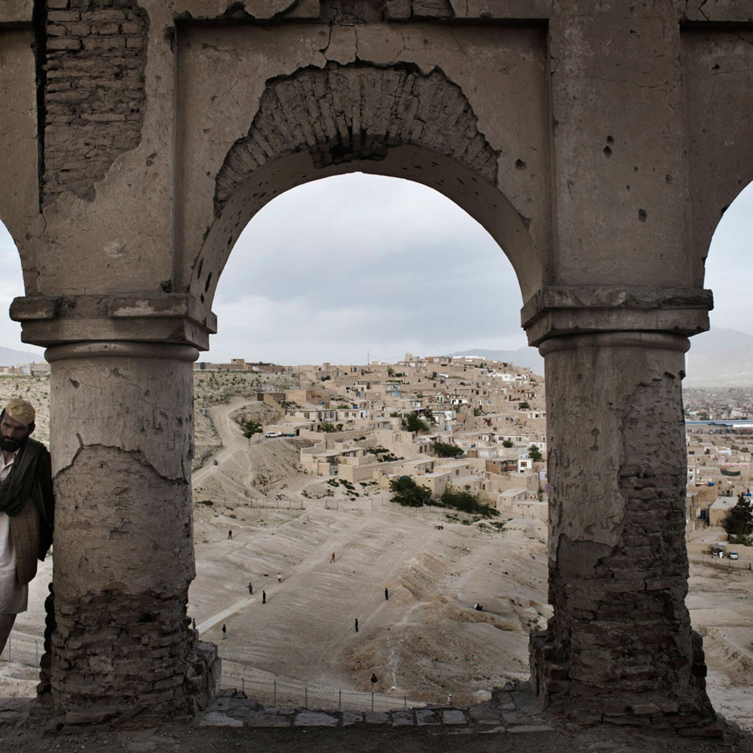 The tomb of Sultan Mohammed Telai, great-great grandfather of Nadir Shir, an Afghan king. Its arches are decorated in Italianate stucco, but the tomb itself is badly damaged and graffitied. The strategic location of the hill is readily apparent from here, and was much fought over in the 1990s.