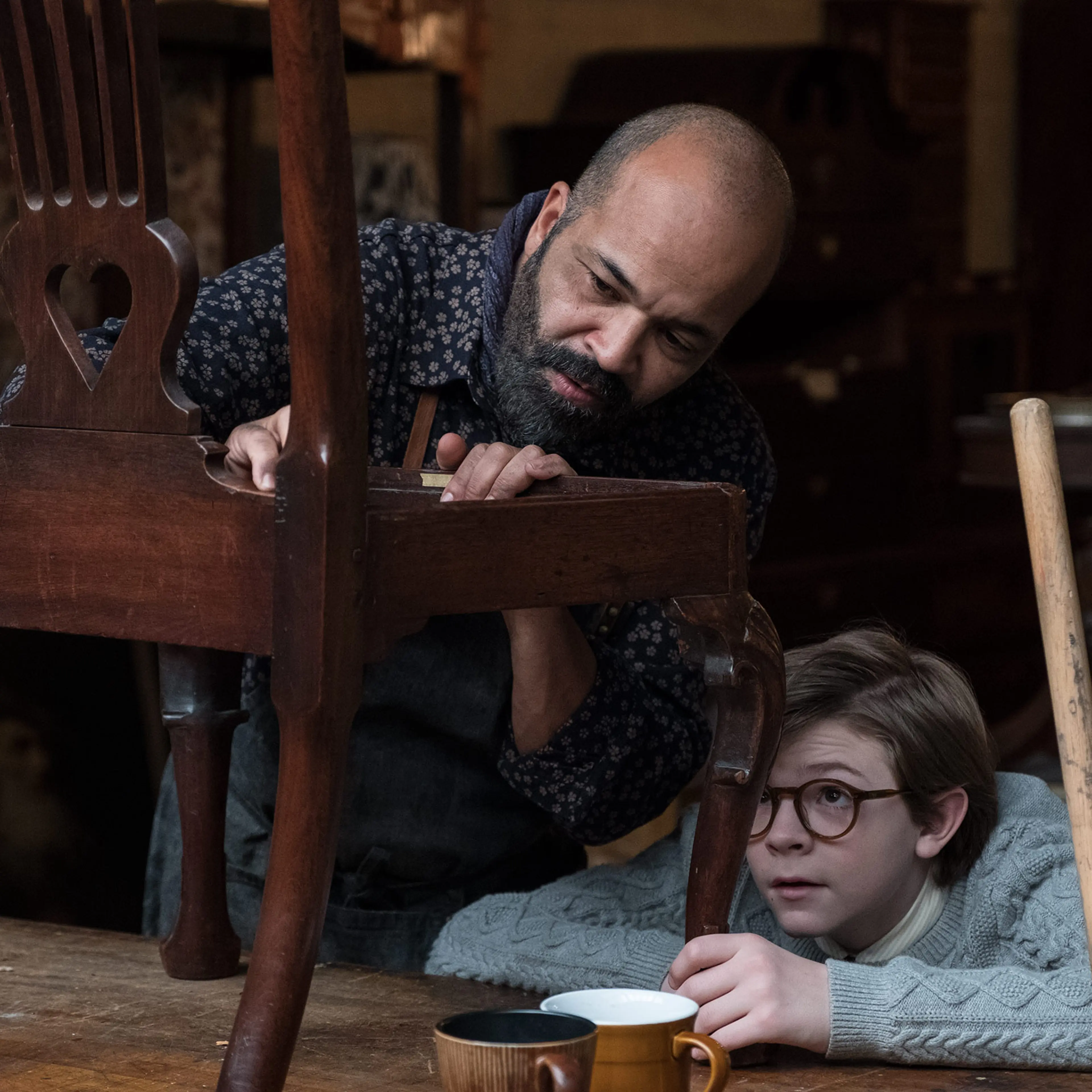 Young Theo (Fegley) gets an education from his mentor and caretaker Hobie (Wright).