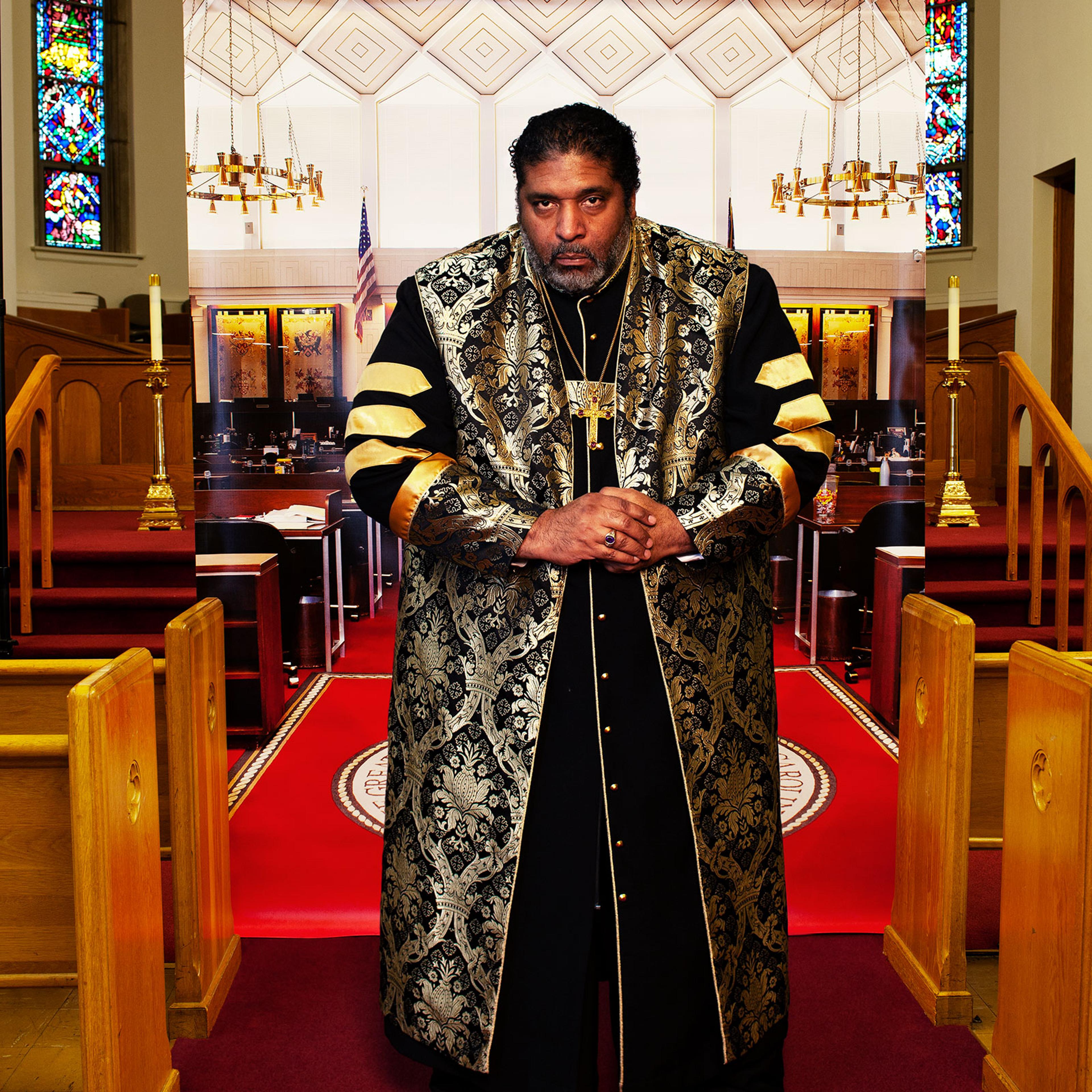 Barber at Pullen Memorial Baptist Church in Raleigh, N.C., on Jan. 27, before a backdrop showing the North Carolina house of representatives chamber where he was arrested in 2011