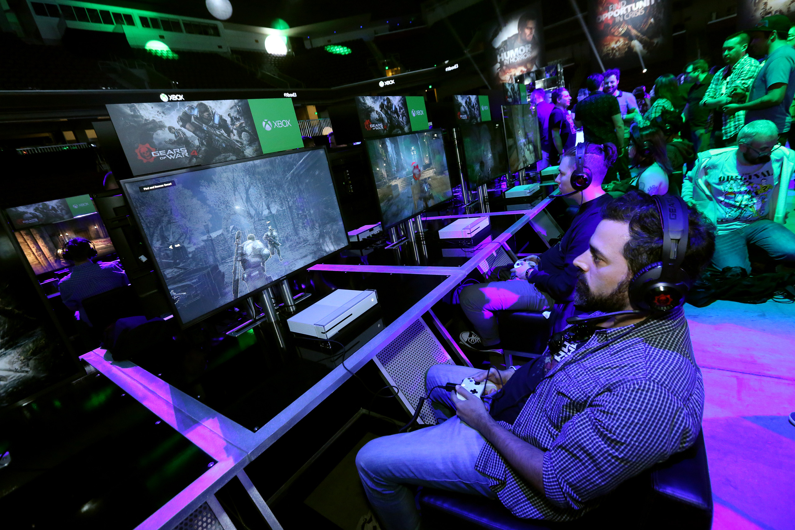 Fans get hands on "Gears of War 4" at the Xbox Media Showcase at E3 2016 in Los Angeles on June 13, 2016.