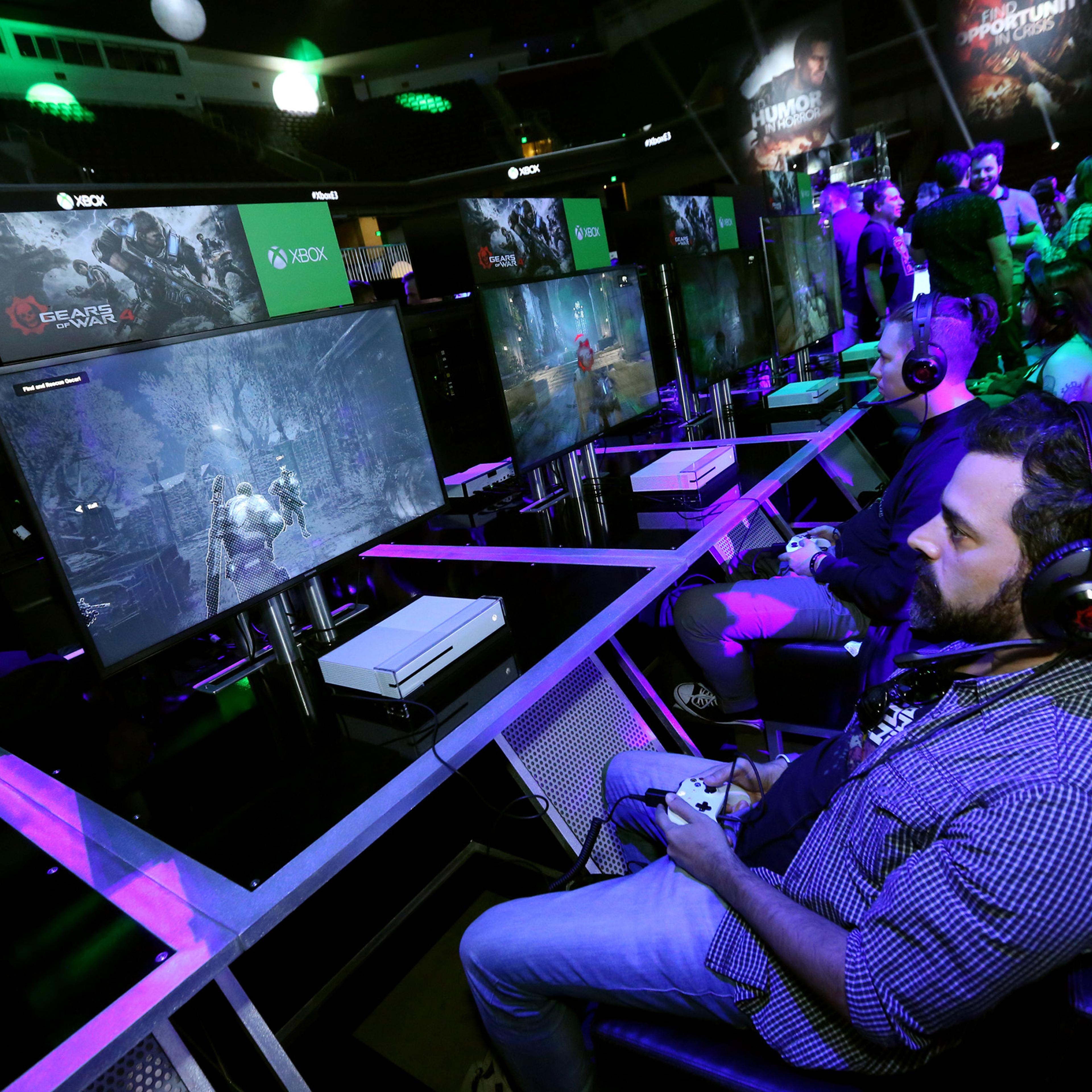 Fans get hands on "Gears of War 4" at the Xbox Media Showcase at E3 2016 in Los Angeles on June 13, 2016.