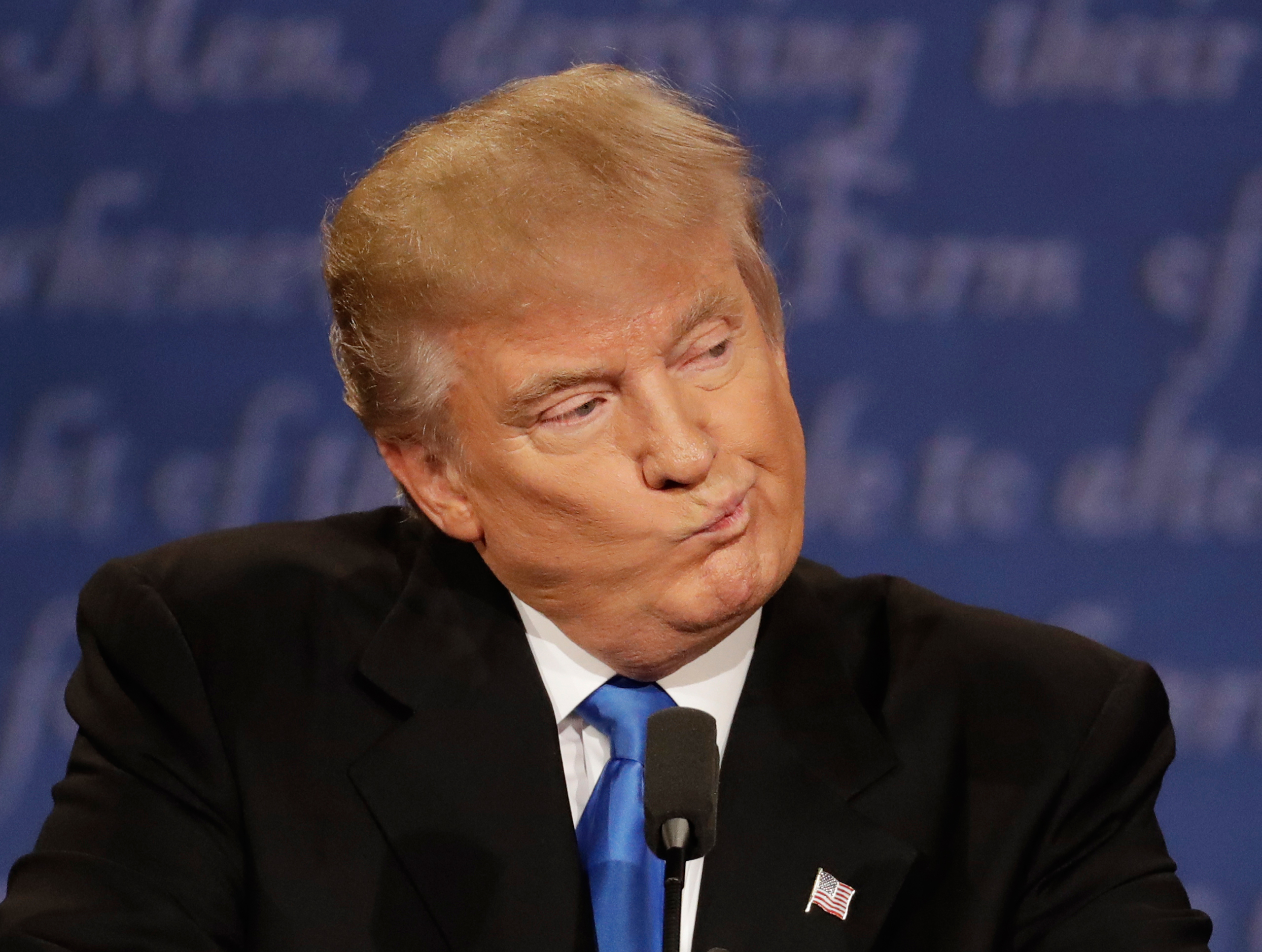 Republican presidential nominee Donald Trump listens to Democratic presidential nominee Hillary Clinton during the presidential debate at Hofstra University in Hempstead, N.Y., Monday, Sept. 26, 2016. (AP Photo/Patrick Semansky)