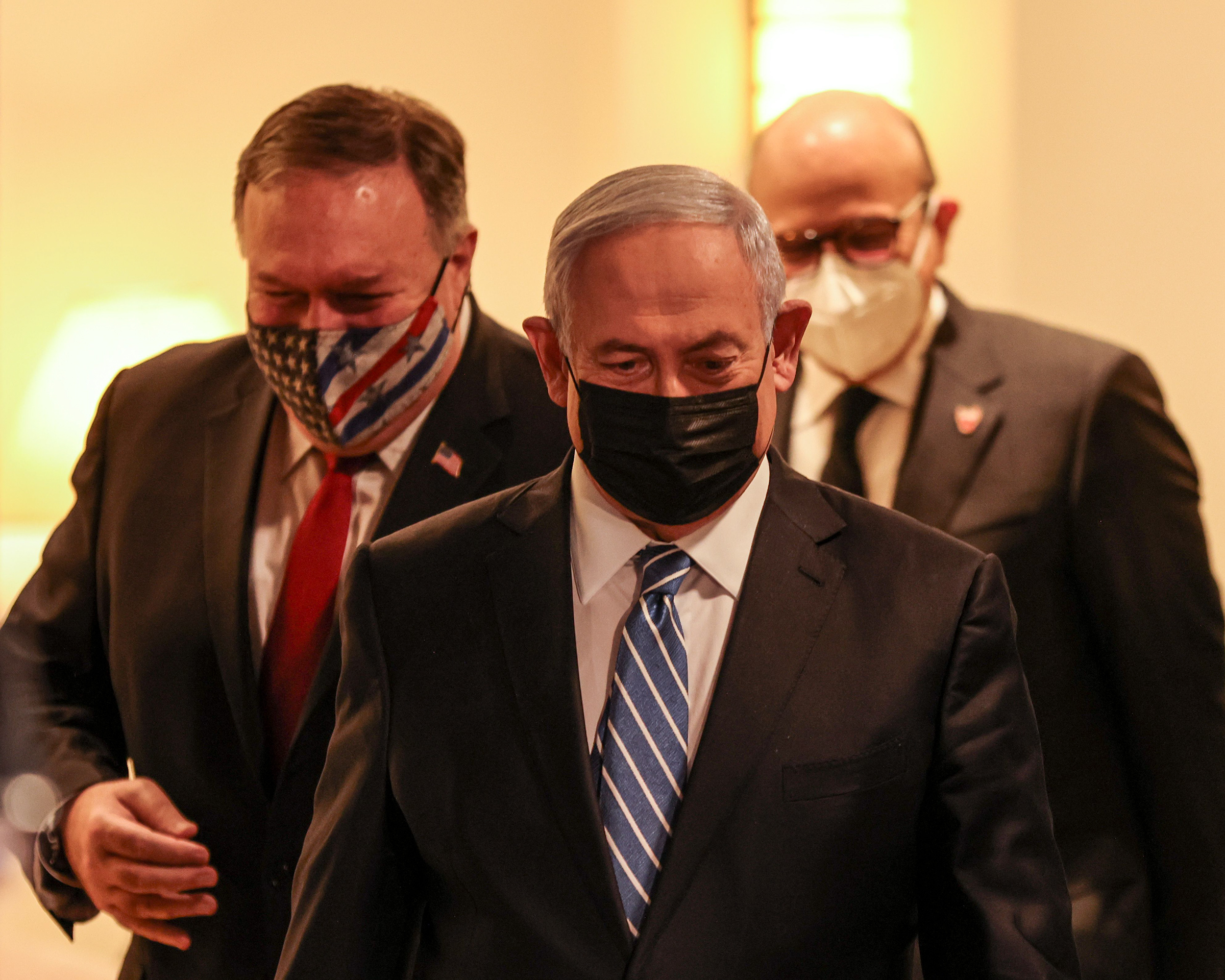 From left, Pompeo, Israeli Prime Minister Benjamin Netanyahu, and Bahrain's Foreign Minister Abdullatif bin Rashid Al Zayani arrive for a press conference after their trilateral meeting in Jerusalem, Nov. 18