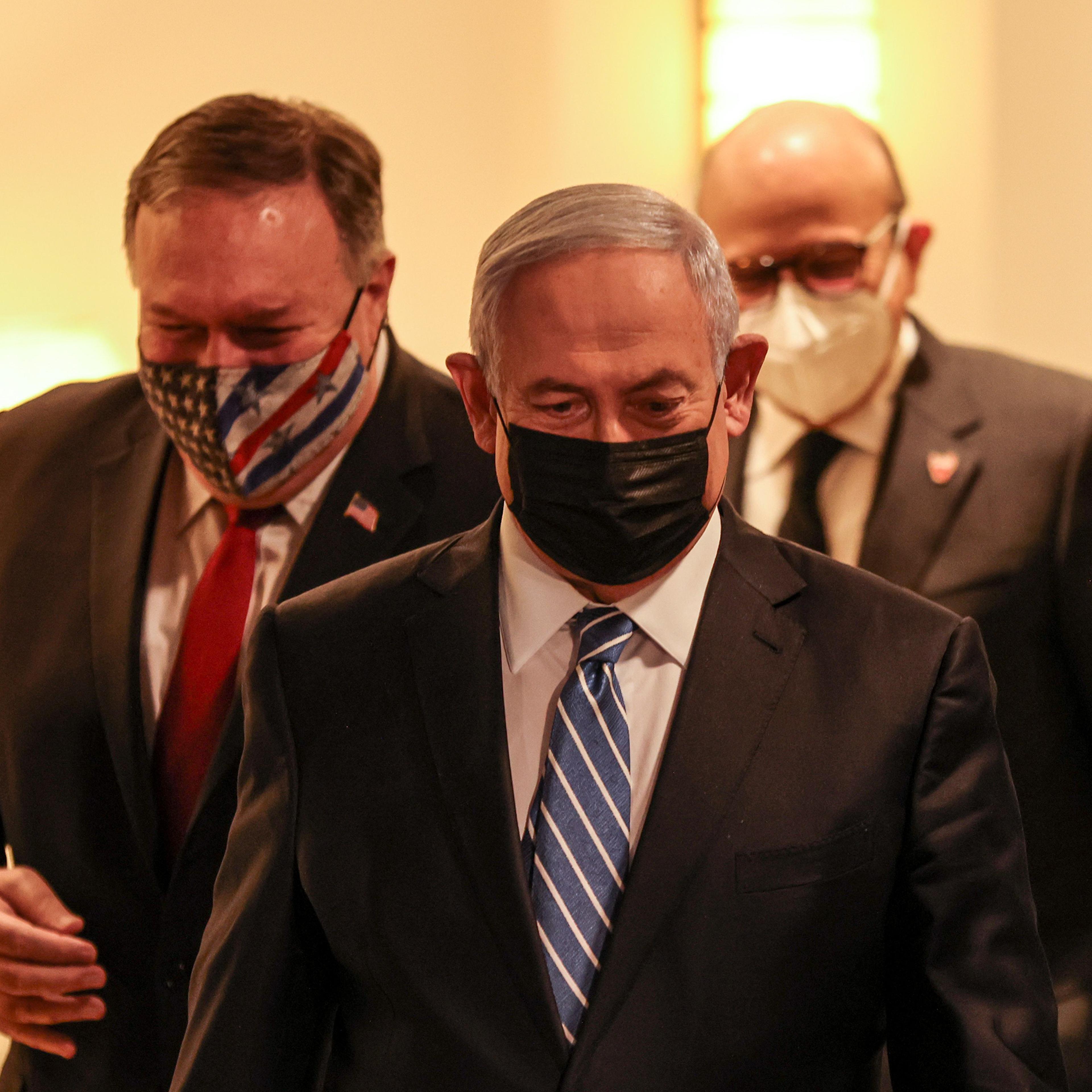 From left, Pompeo, Israeli Prime Minister Benjamin Netanyahu, and Bahrain's Foreign Minister Abdullatif bin Rashid Al Zayani arrive for a press conference after their trilateral meeting in Jerusalem, Nov. 18
