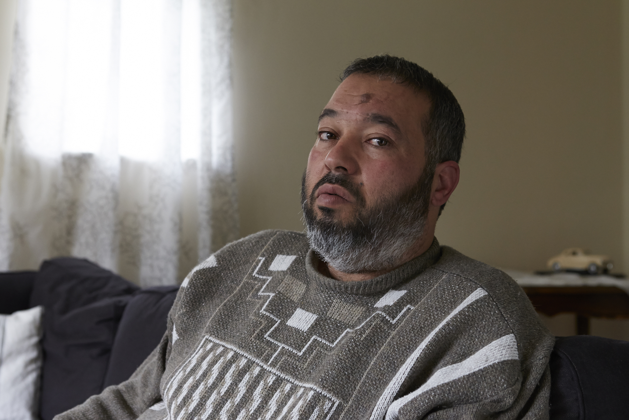 Abubaker Deghayes at home in Saltdean, United Kingdom, mourning the death of his son Abdullah, 18, who was killed in Syria after he volunteered with some of his brothers, to fight alongside the rebels in the civil war.