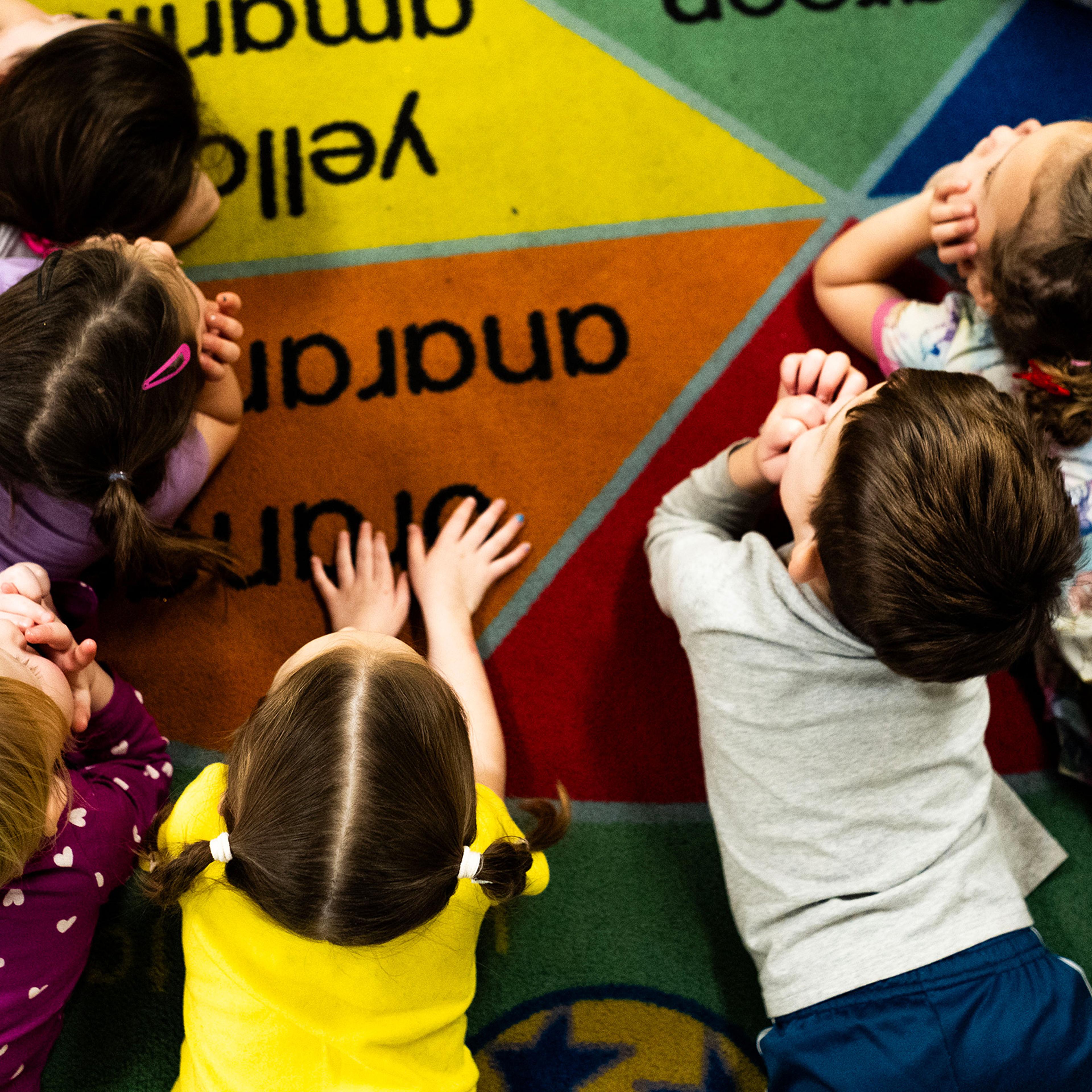Children listen to a story at TLC for Tots daycare center in Nampa, Idaho on Nov. 20, 2024.