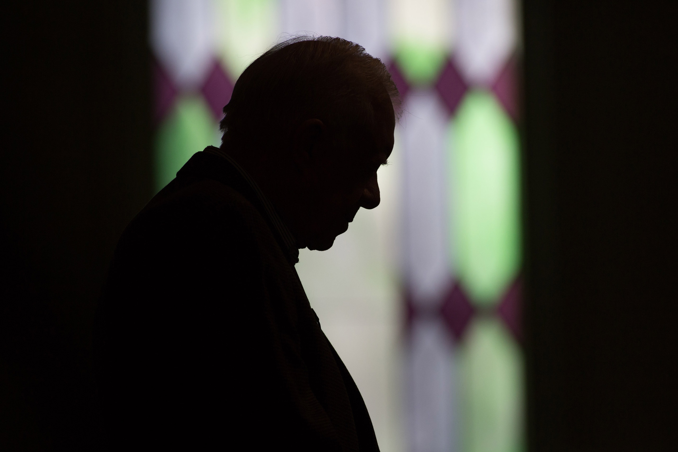 Former President Jimmy Carter prays during Sunday School class at Maranatha Baptist Church in his hometown, Sunday, Dec. 13, 2015, in Plains, Ga. A recent MRI showing no cancer on Jimmy Carter's brain is "very positive" news for the former president but 