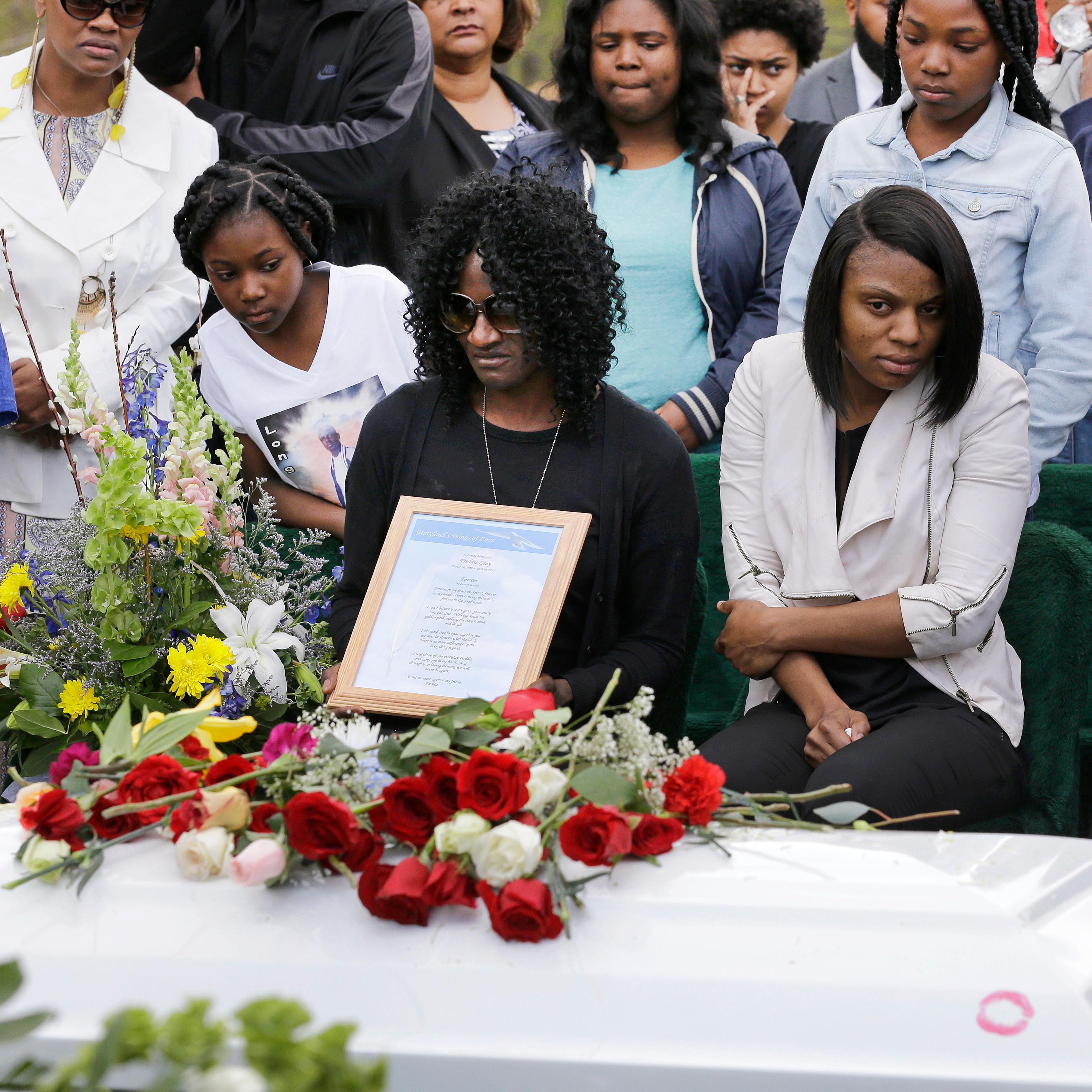 Gloria Darden (C), mother of Freddie Gray, at Gray's burial in Baltimore on April 27, 2015.
