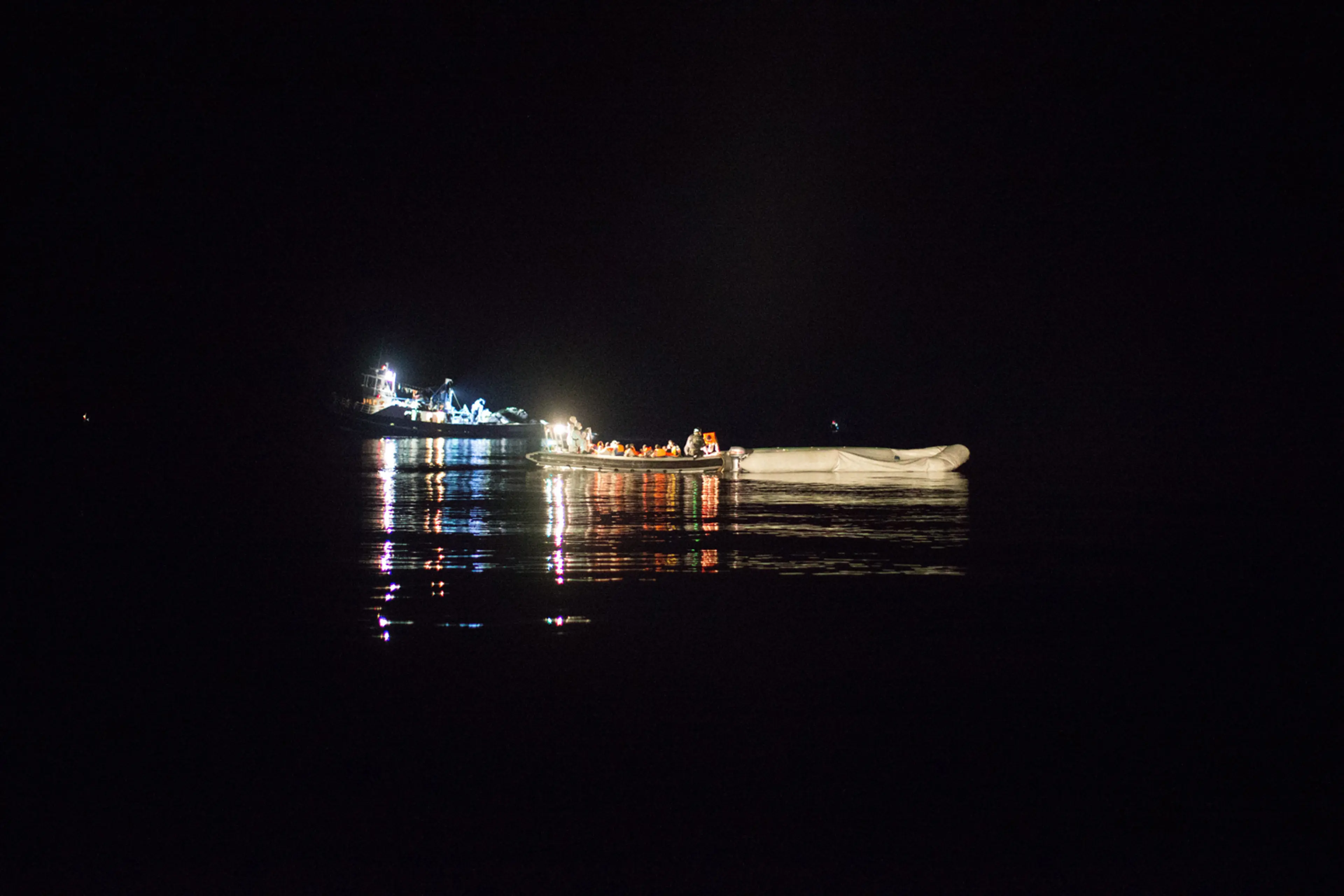 African refugees rescued by the Italian navy at night off a rubber dinghy, June 8.