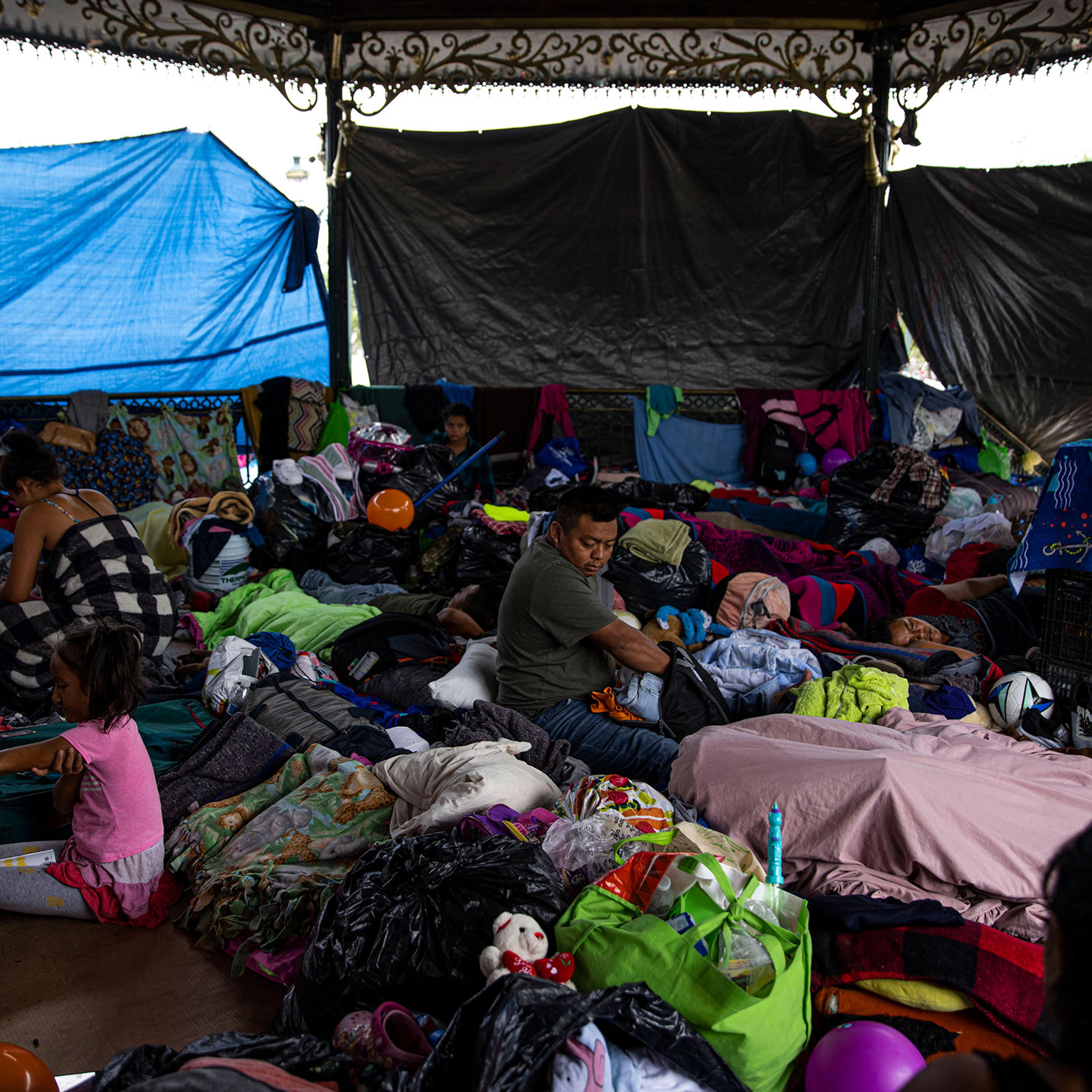 Migrants take refuge in a gazebo in Reynosa, Tamaulipas, Mexico on May 6, 2021. Hundreds of migrants have begun living in shelters and a makeshift tent encampment in Reynosa as a result of Title 42, a Trump-era policy that has remained in place under the Biden Administration and allows the government to immediately “expel” anyone who attempts to enter the U.S., even if they wish to make a claim for asylum, because of the risks posed by COVID-19.