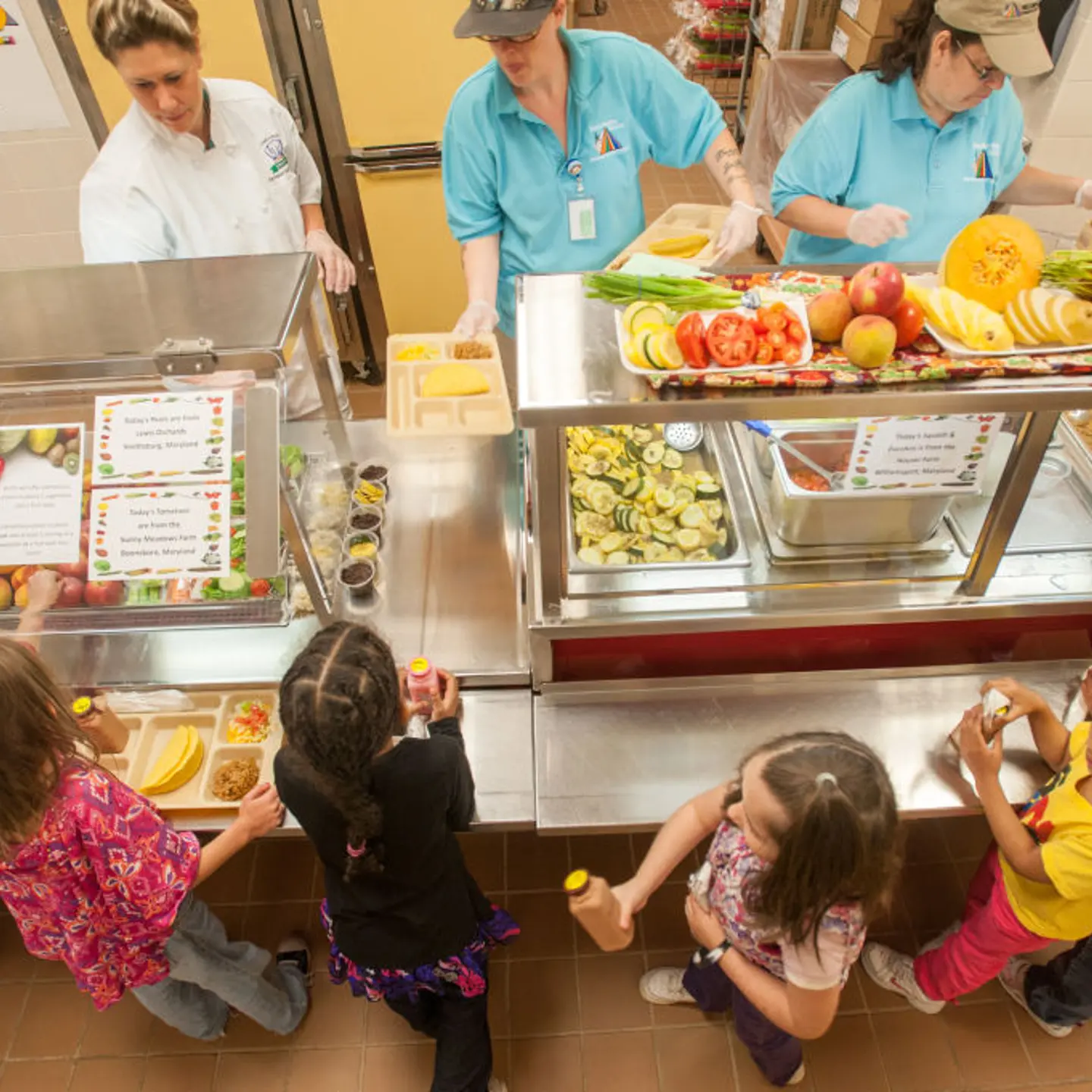 Elementary School Children in line at cafeteria being served healthy lunches Hagerstown, Maryland