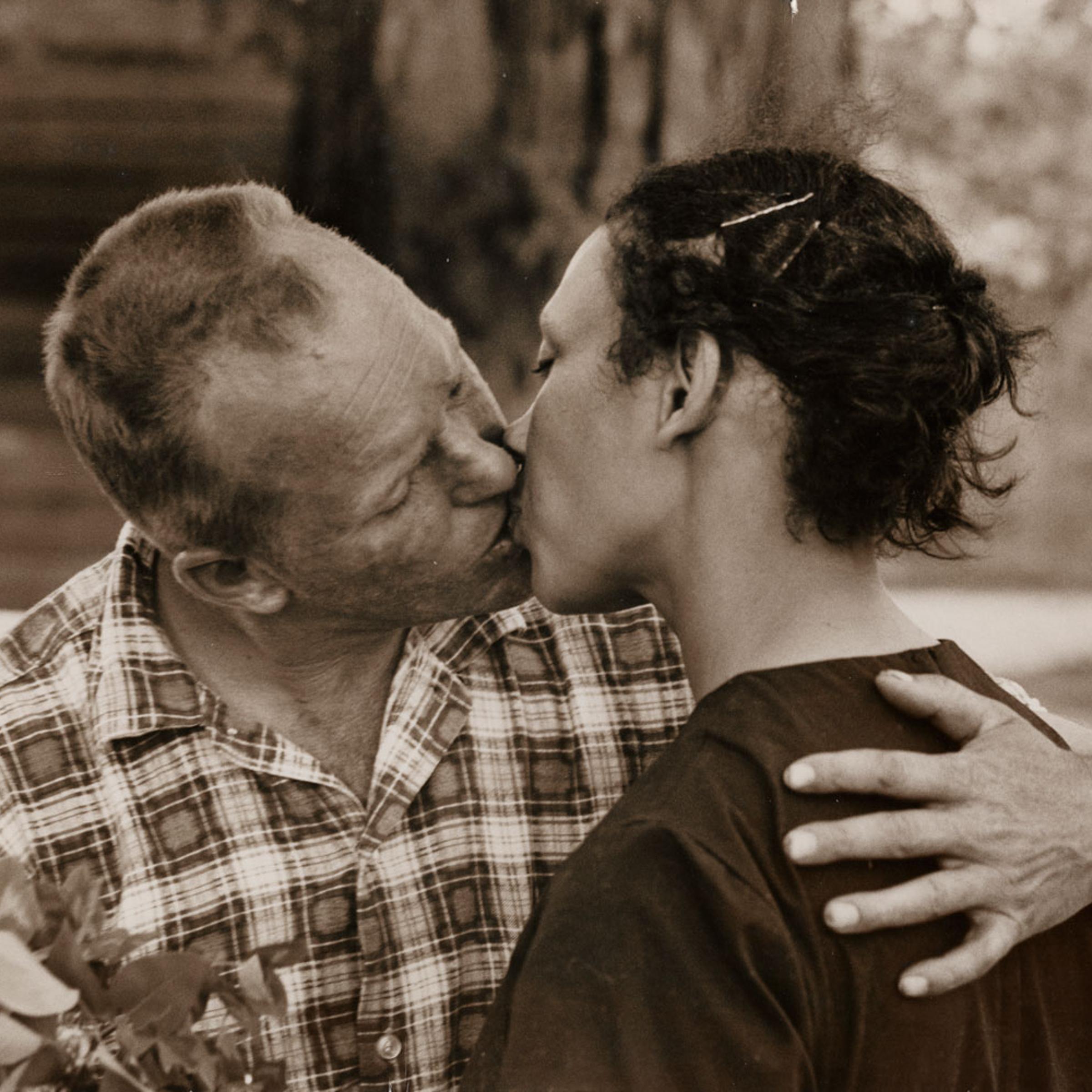 Richard Loving kissing wife Mildred as he arrives home from work, King and Queen County, Virginia, April 1965.