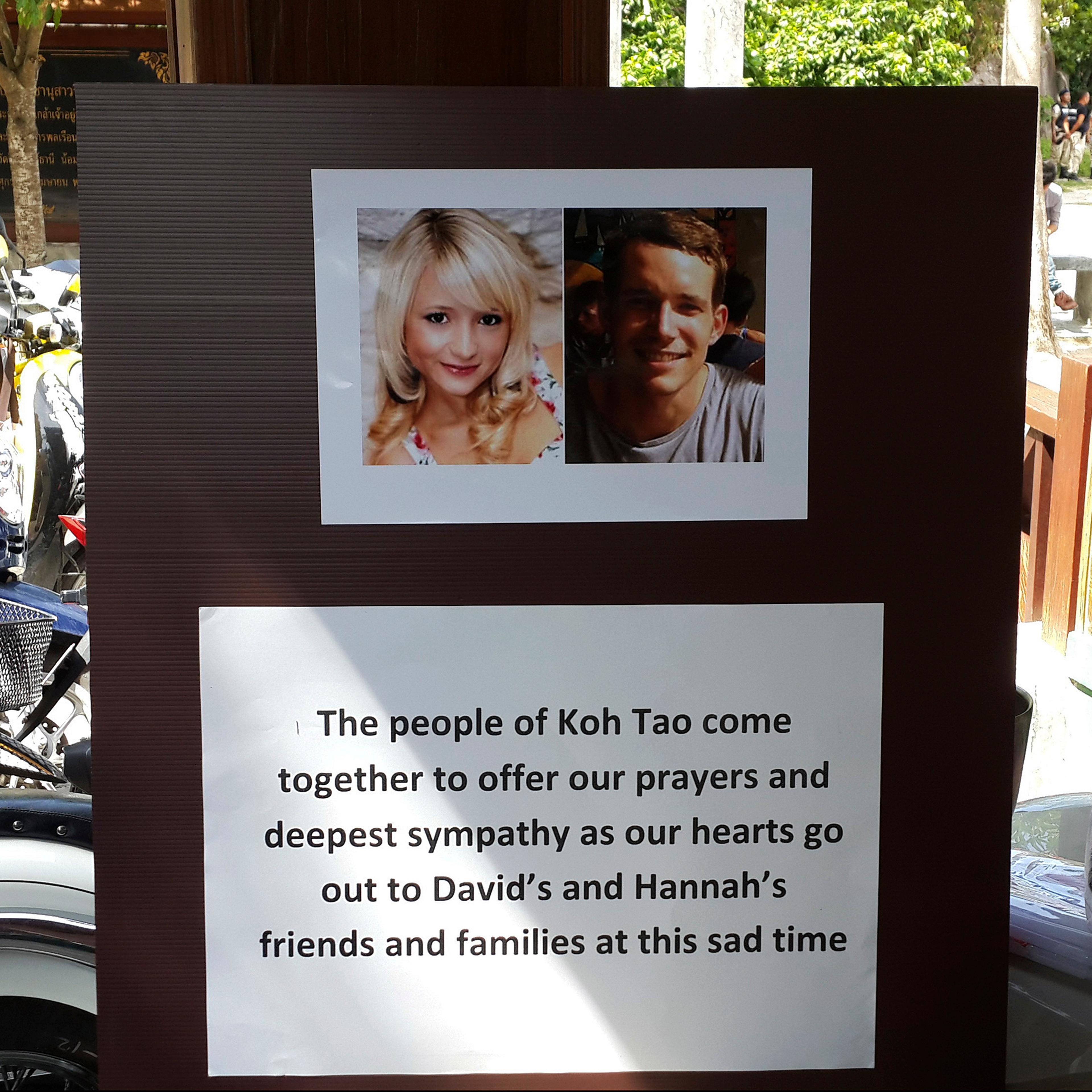 Pictures of killed British tourists David Miller and Hannah Witheridge and a message of support to their friends and families are displayed during special prayers at Koh Tao island