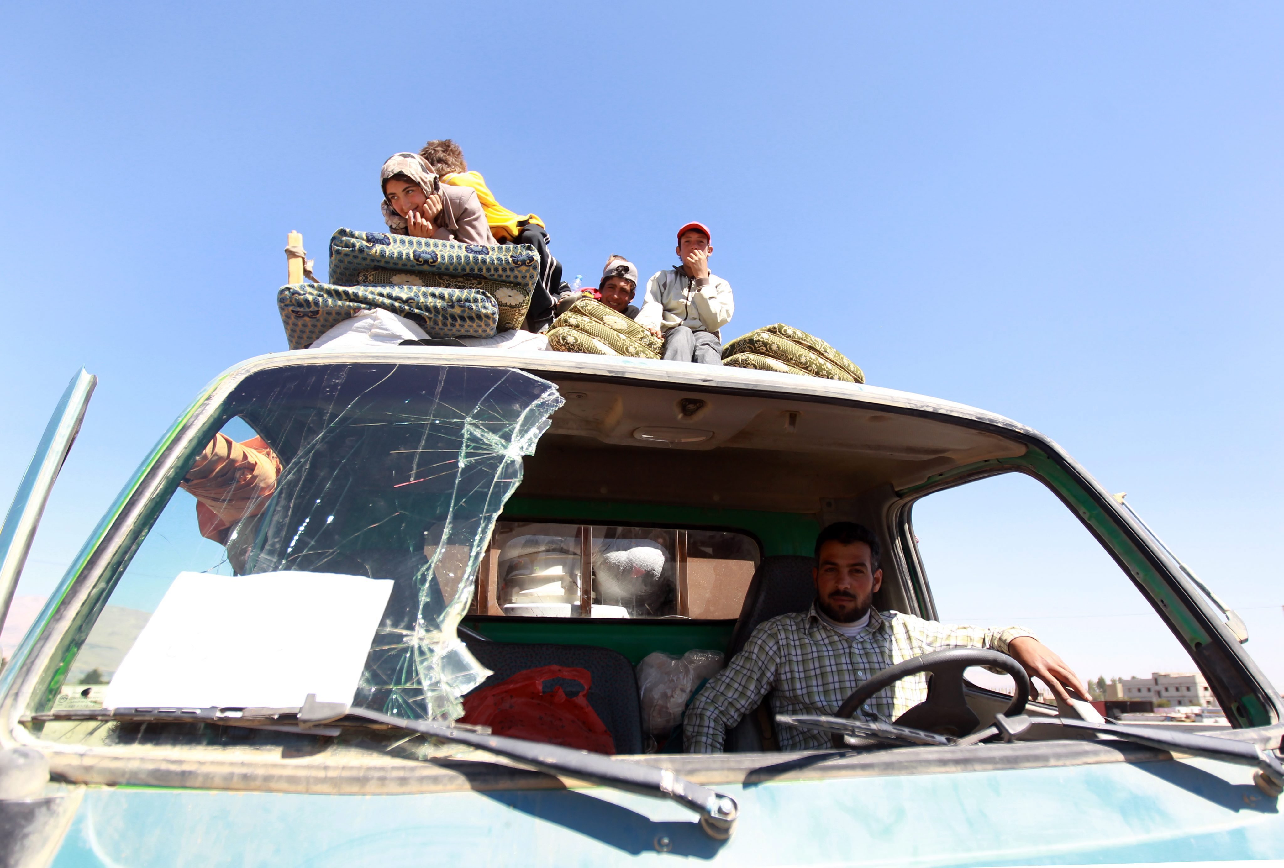 Syrian refugees flee conflict in Lebanon