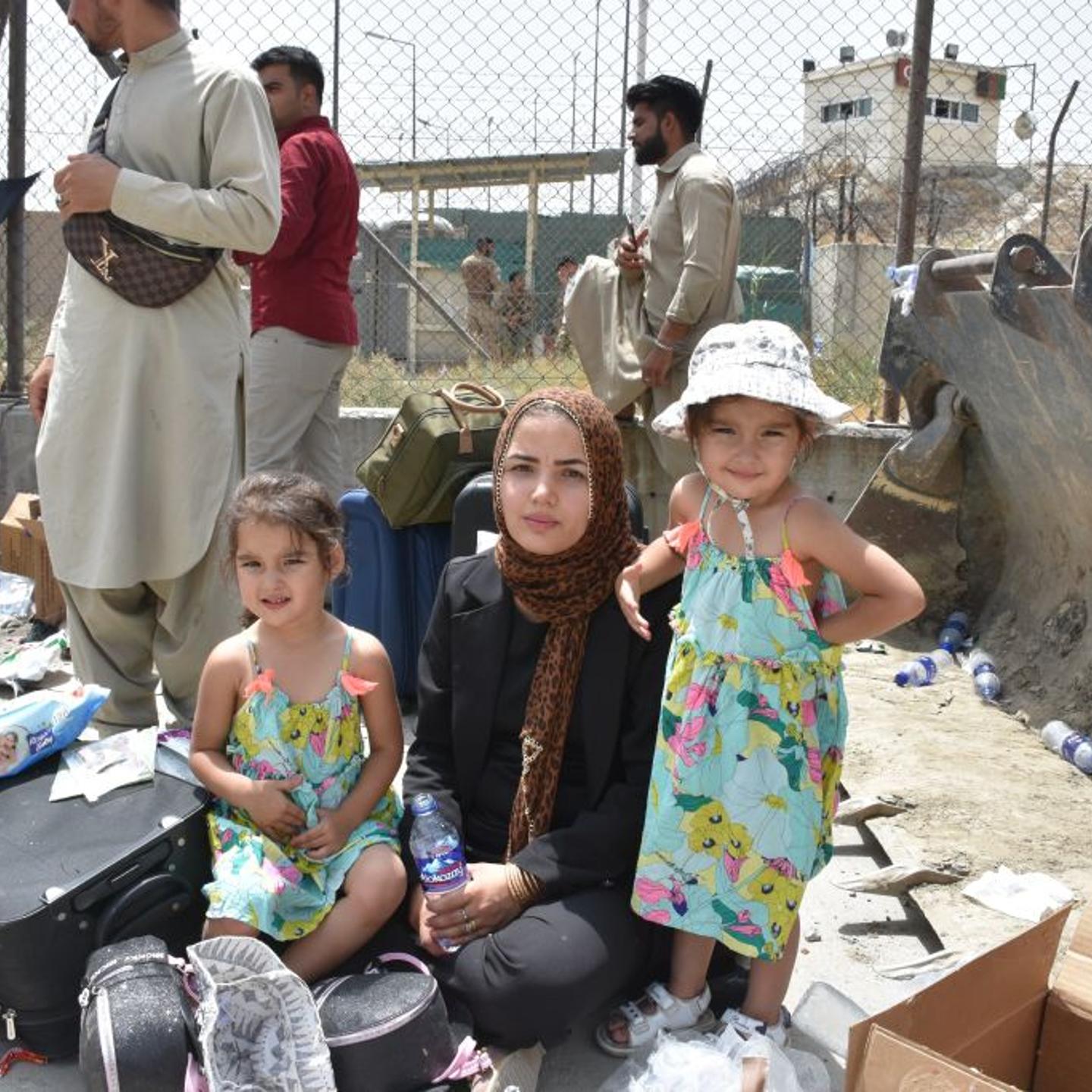 Afghans continue to wait at airport in Kabul