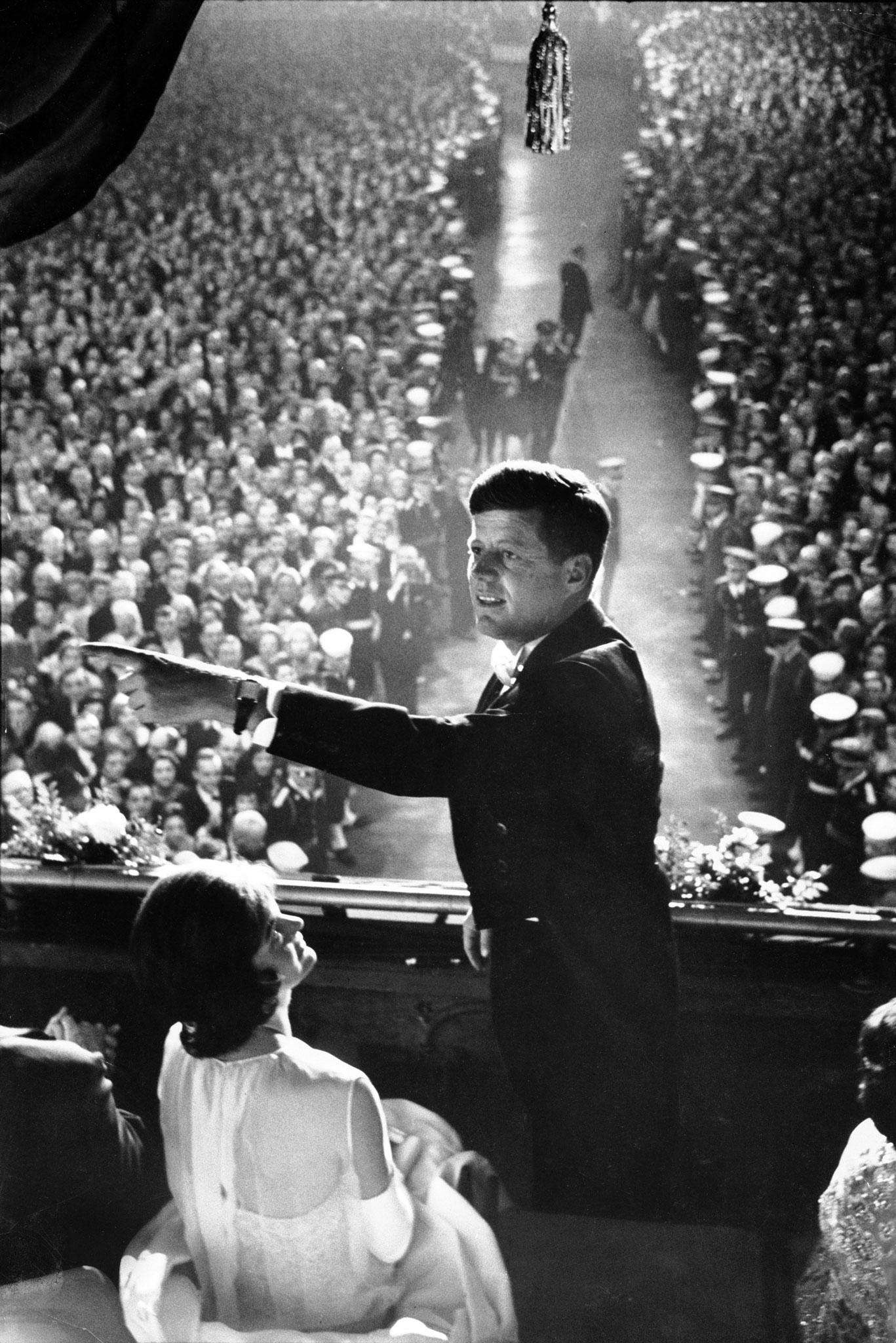 President John F. Kennedy and First Lady Jacqueline Kennedy in the Presidential Box overlooking the crowd at inaugural gala, Jan. 20, 1961.