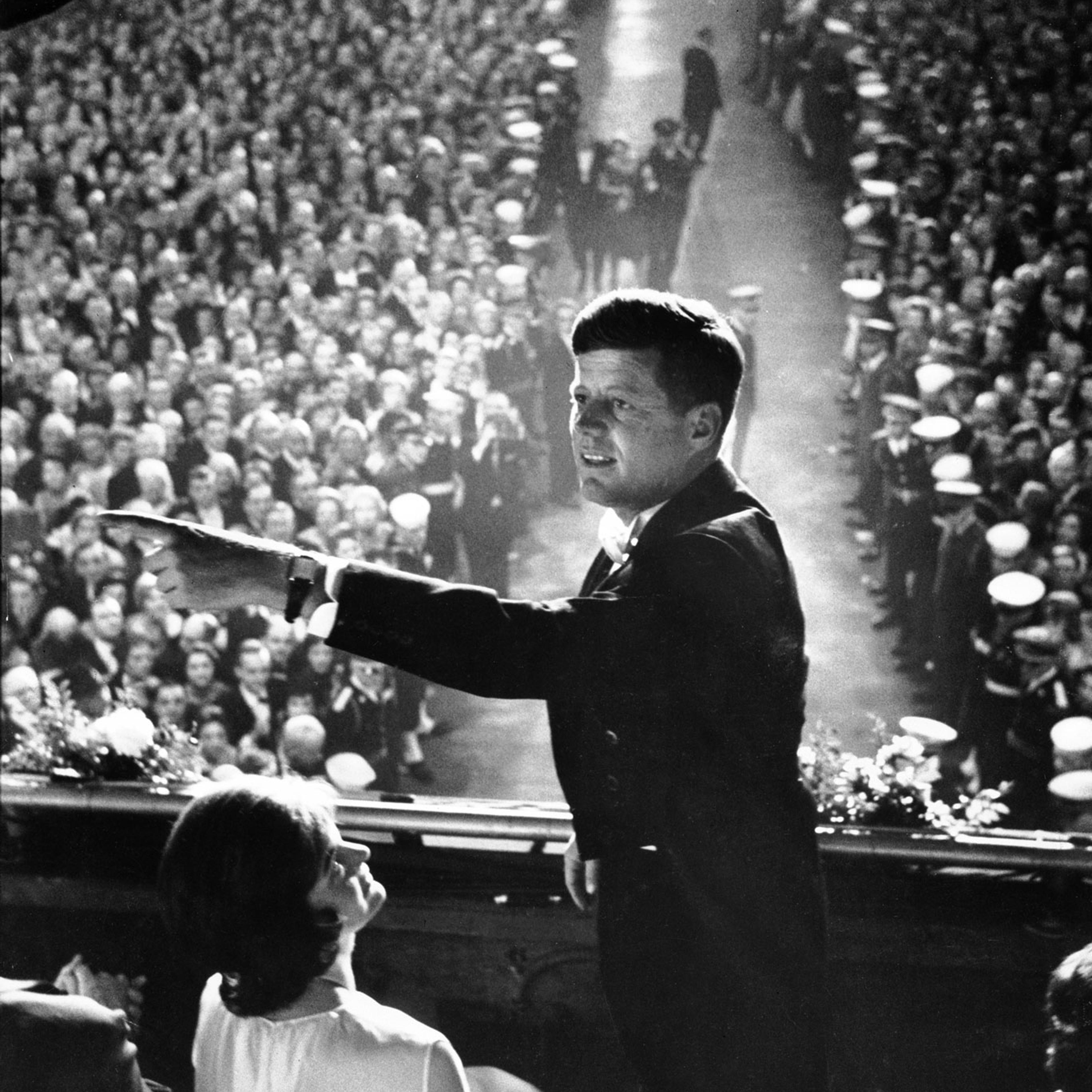 President John F. Kennedy and First Lady Jacqueline Kennedy in the Presidential Box overlooking the crowd at inaugural gala, Jan. 20, 1961.