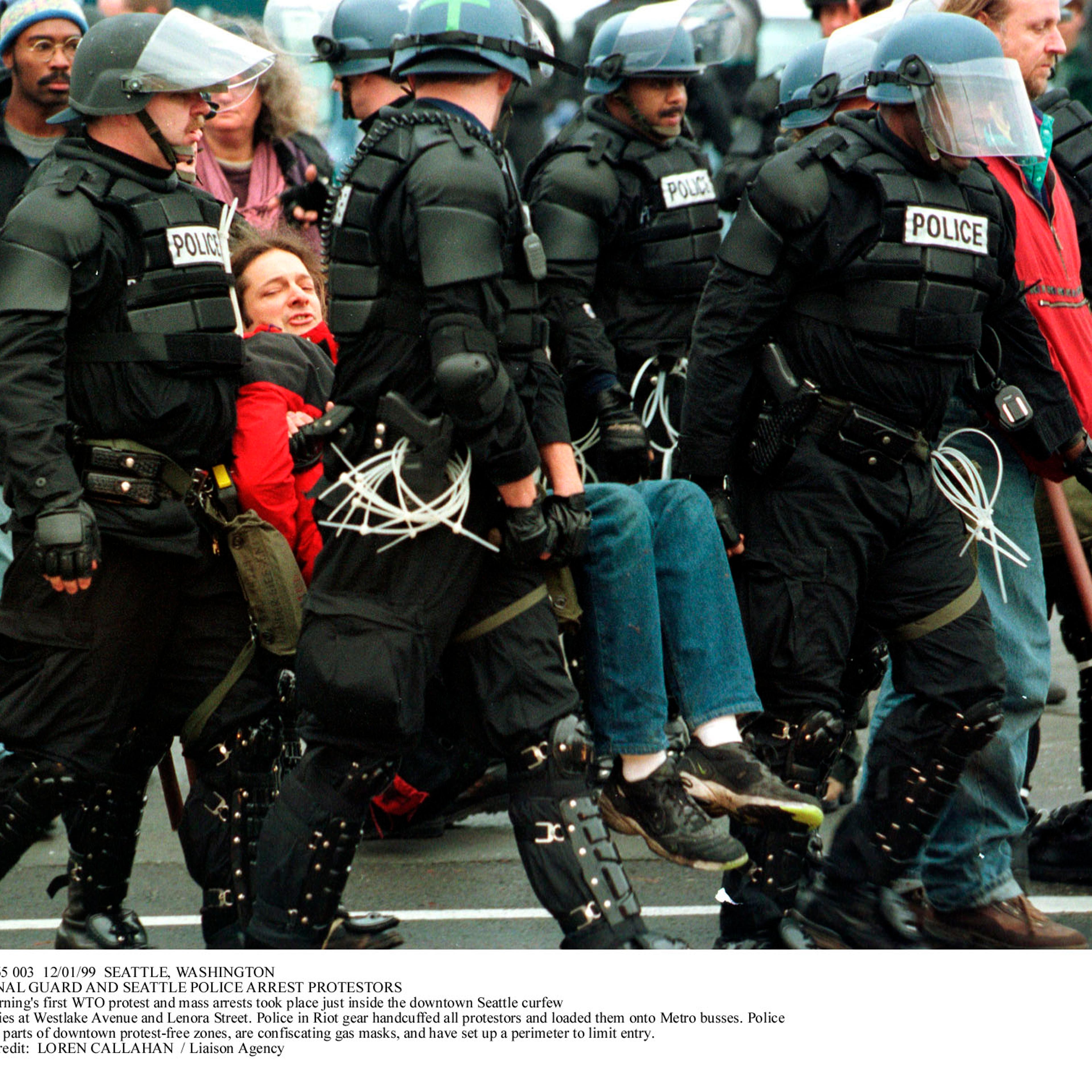 National Guard and Seattle police arrest WTO protestors , November 1999
